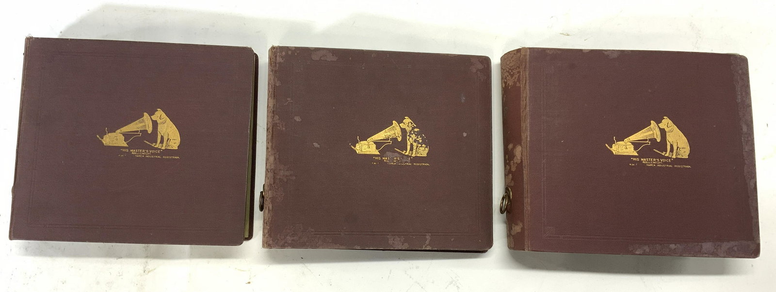 Lot 40+ Vintage Records In Binders: Lot has 40+ vintage records includes BARITONE SOLO BY OSCAR SEAGLE, DOWN IN THE FOREST BY JOHN McCormack & BECAUSE BY EVAN WILLIAMS. Lot includes 3 maroon toned binders with gold toned trademark with 