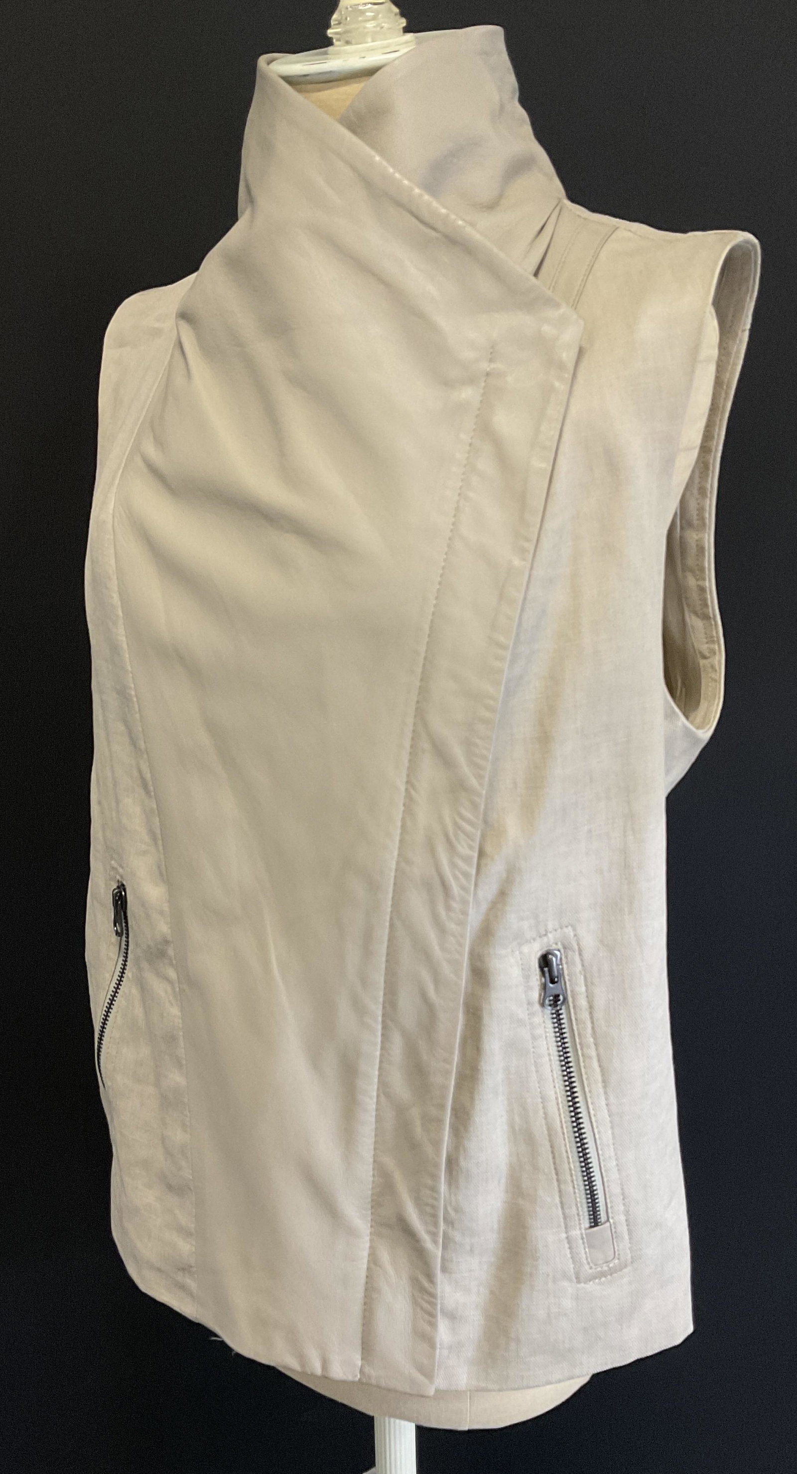 VINCE Linen & Cotton Vest, Leather Trim: VINCE Linen & Cotton Vest, Leather Trim. Label reads ‘Vince, 52% Linen, 48% Cotton, 100% leather contrast, size L.’ Surface wear consistent with age and use. Some stains. Leather wear, VINCE wear,