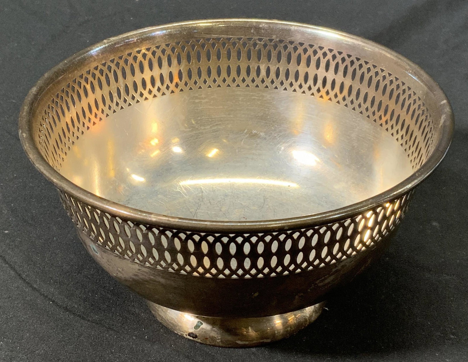 FB ROGERS Silver Plated Punched Copper Bowl: Vintage FB ROGERS bowl with punched metal detail around rim. Silver plate over copper. Trademarked and marked 1912 to underside . Measures approx. 5.25 inches diameter and 3 inches tall. Wear to surfa