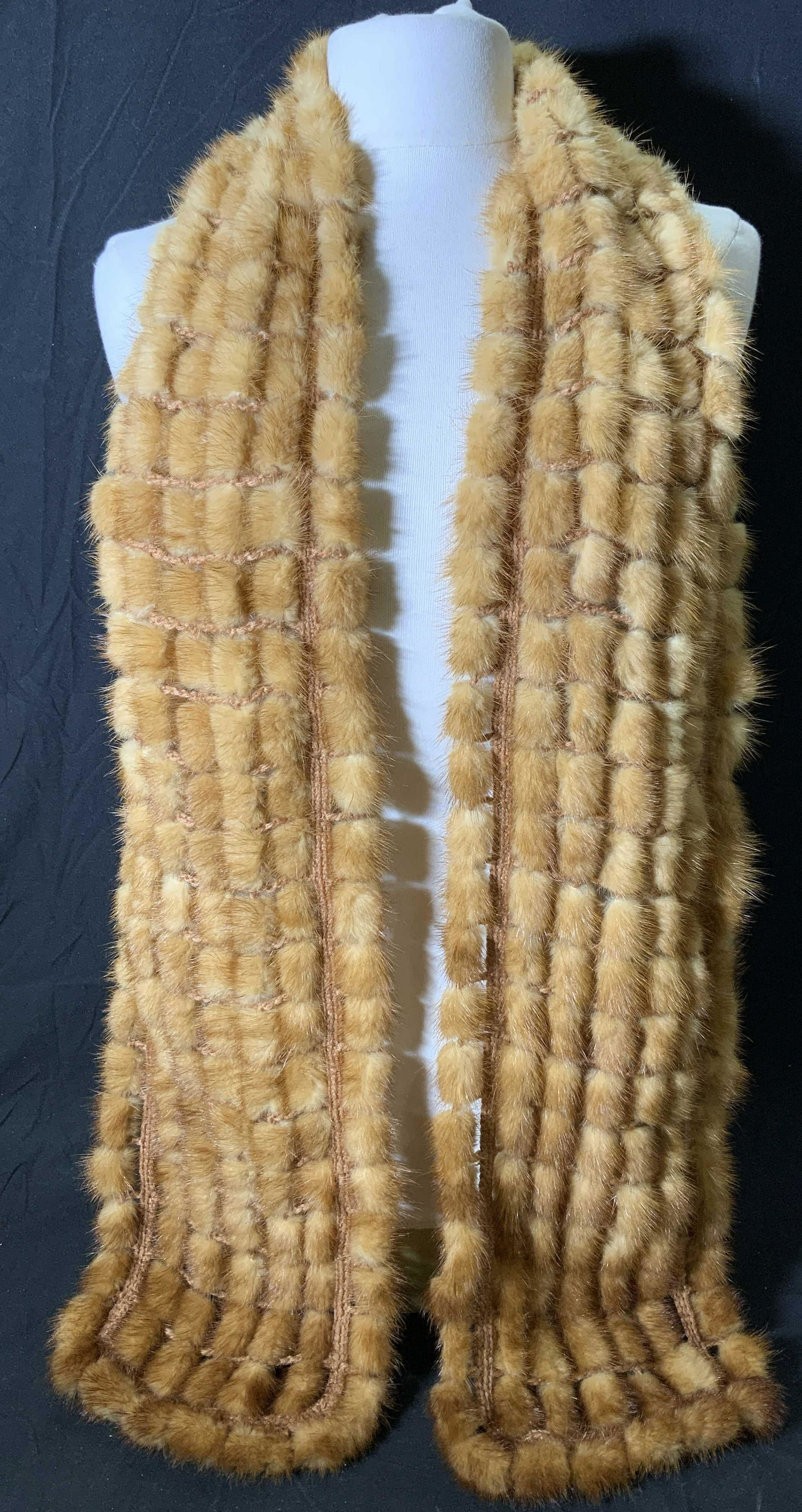 ADRIENNE LANDAU Mink Window Pane Scarf: Adrienne Landau mink fur scarf with window pane detail. Tag reads ADRIENNE LANDAU, BERGDORF GOODMAN. measures approx. 70 inches long. In good condition. Adrienne landau, ladies luxury scarf, ladies fu