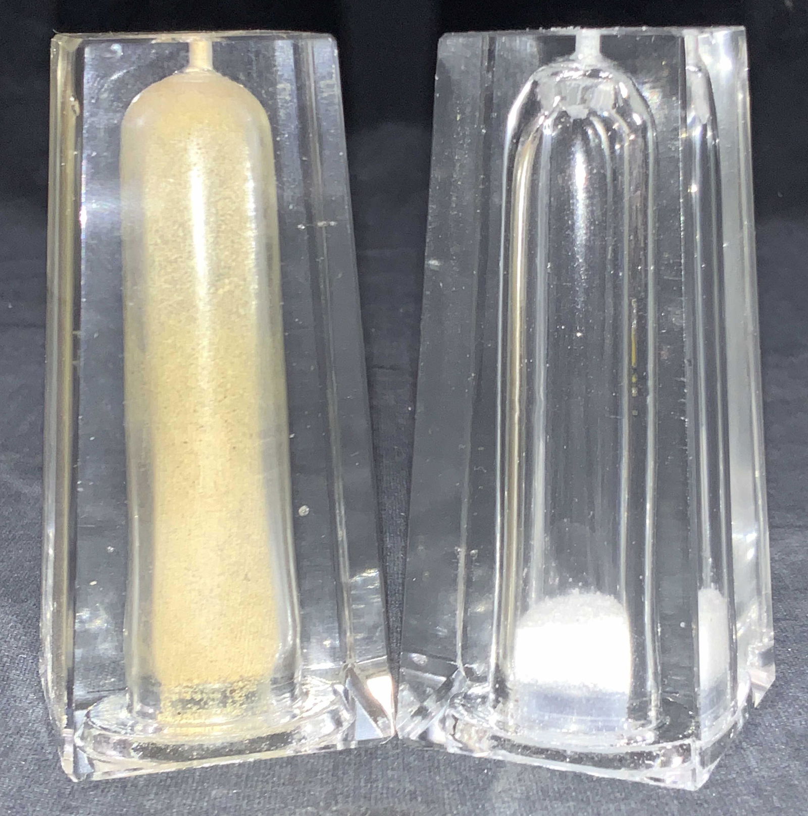 Pair Art Deco Glass Salt & Pepper Shakers: Pair of Art Deco glass salt and pepper shakers in rectangular shapes. Approximately 3.25 inches tall. Minor chipping to edges. Art Deco salt shakers, salt shakers, kitchen utensils, kitchen accessorie