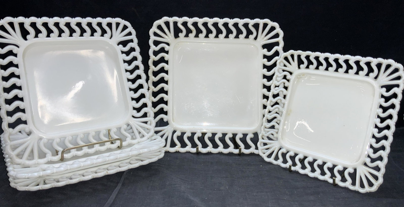 WESTMORELAND Milk Glass Dish Set: Set of 5 Westmoreland dishes made of milk glass. 1 7.5 inch diameter plate, 1, 9.5 inch diameter plate and 3, 8.25 inch diameter dishes. Condition is consistent with vintage age and use. Vintage milk 