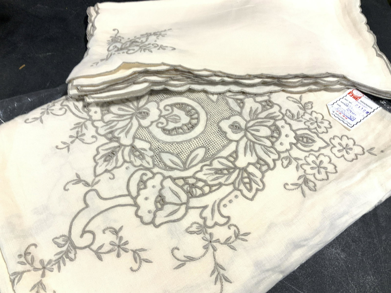 Set13 Handmade Embroider Linen Tablecloth, Napkins: NIP. Luxury mid century linen tablecloth and dinner napkins, New Old Stock, Never Used and in original cellophane Package. Label on tablecloth reads FJHE HANDMADE 100% linen, 72 x 144 in. Total of 12 