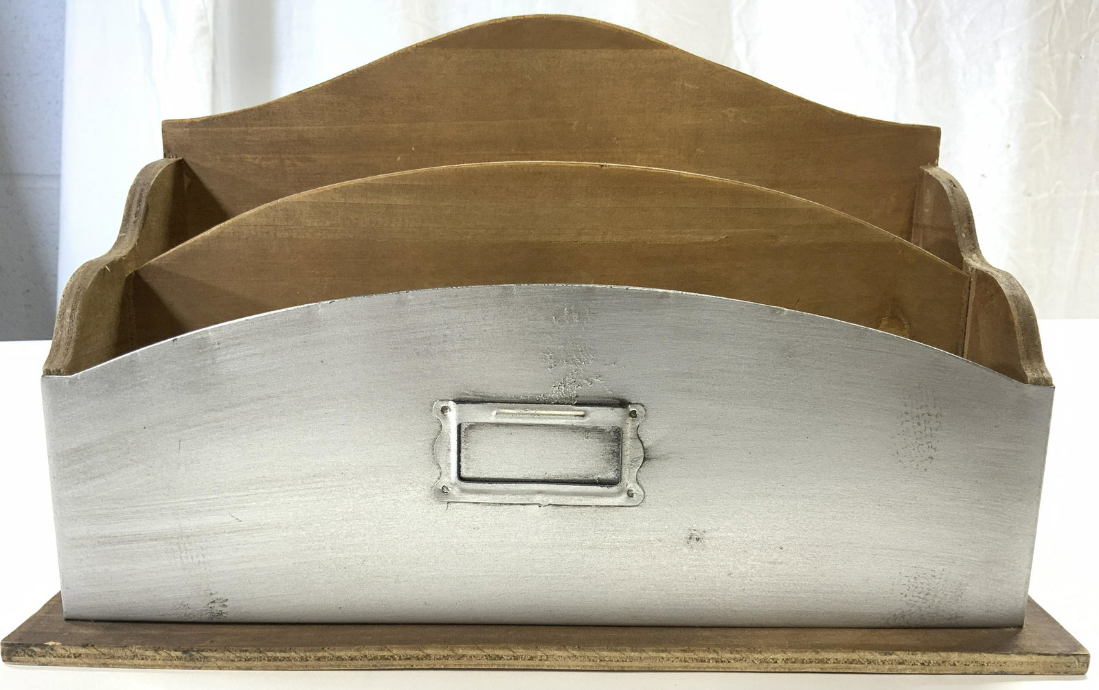 Vintage Metal & Wooden Stationary Holder: Stationary holder is vintage. Piece is metal and wooden with 2 pockets. Base is rectangular shaped. Front of piece has label holder. Piece measures approx 13 inches long 8 inches tall 5 inches deep. P