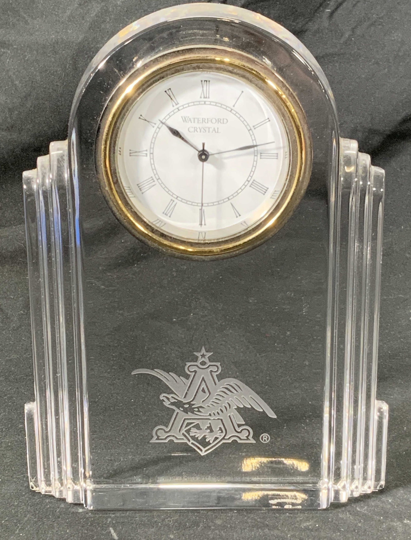 WATERFORD Anheuser Busch Crystal Desk Clock: Vintage Waterford Crystal Art Deco desk clock with Anheuser Busch trademark etched to center. Waterford signature etched to underside. Not tested for function. Measures approx. 5.5 x 1.5 x 7 inches. I