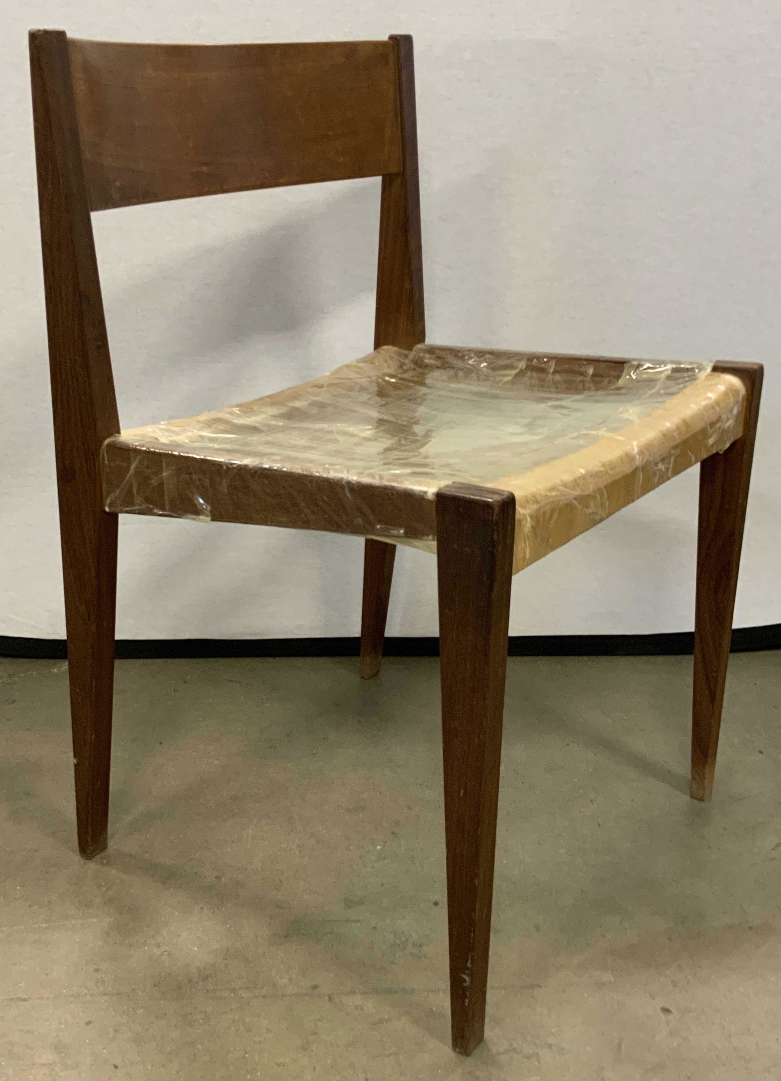 Vintage Poul Volther Frem Rojle Style MCM Chair: Poul Volther Frem Rojle style vintage chair. Scandinavian design featuring tapered legs. Appears to be teak wood. Tape covering seat area. No seat. Some discoloration and cracking to piece. Measures a