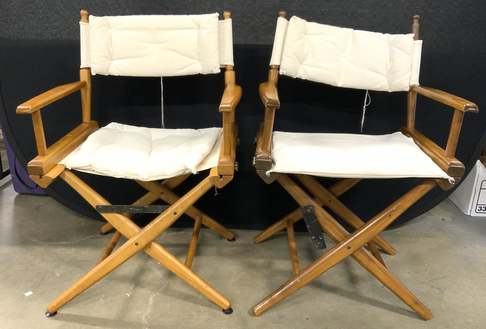 TELESCOPE Pair Wood & Cloth Directors Chairs: Underside of 1 arm reads TELESCOPE CASUAL FURNITURE. Each piece has wooden frames & hinges at bases of arms. Each chair measures approx 34 inches tall 23 inches wide 19 inches deep. Directors chairs, 