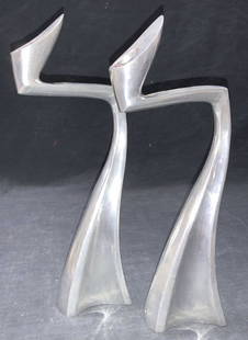 MATTHEW HILTON Designer Swan Candle Sticks: Pair of aluminum crafted Art Deco angled Swan candle stick holders, possibly designed by Matthew Hilton, Matthew Hilton (born 1957) is a British furniture designer of modern furniture and lighting. Ca