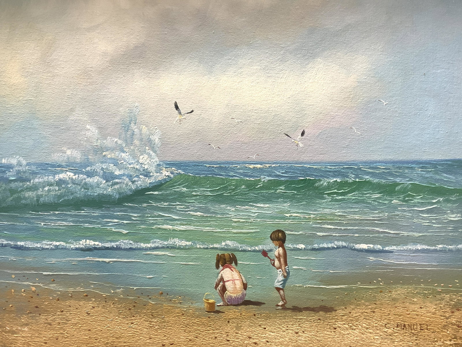 C. MANUEL Children On The Beach Painting: C. MANUEL Children On The Beach Painting, acrylic on board, signed in lower right C. Manuel, subject shows a little girl and a little boy playing in the sand facing the tide, in frame measures approx 