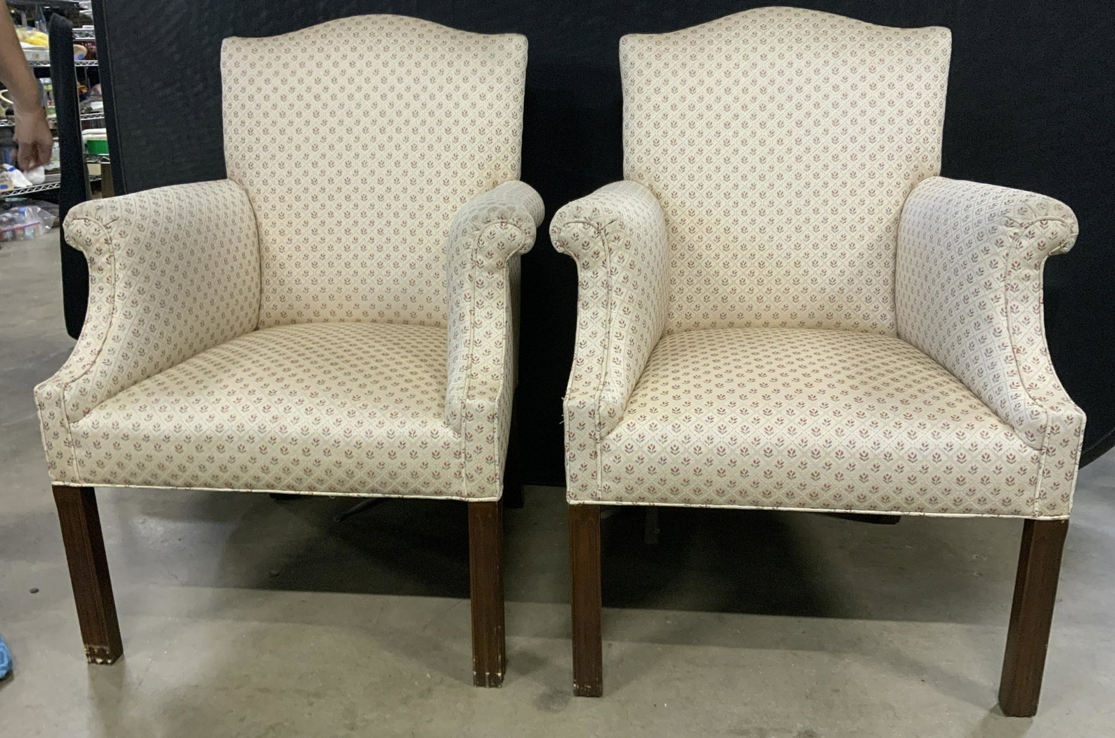 Pair Vintage Upholstered Armchairs 20th Century: Lot includes 2 armchairs. Each are vintage. Armchairs each have floral, & geometric detail. Chairs each have 4 carved wooden legs. Chairs each measure approx 38 inches tall 29 inches wide & deep. Chai