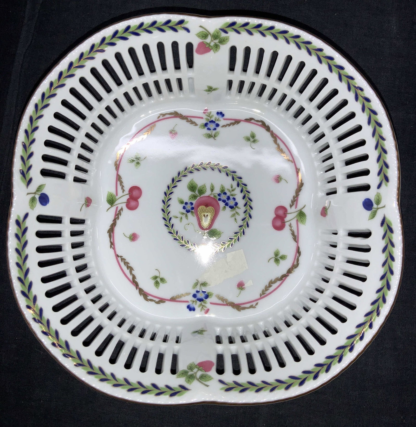 MAPLE Fine China Hand Painted Dish: Fine China hand painted dish with vertical cut outs on edges and hand painted with strawberries and leaves on exterior. Center is painted with fruit and floral motifs. Gold gilt rims. Marked MAPLE, FI
