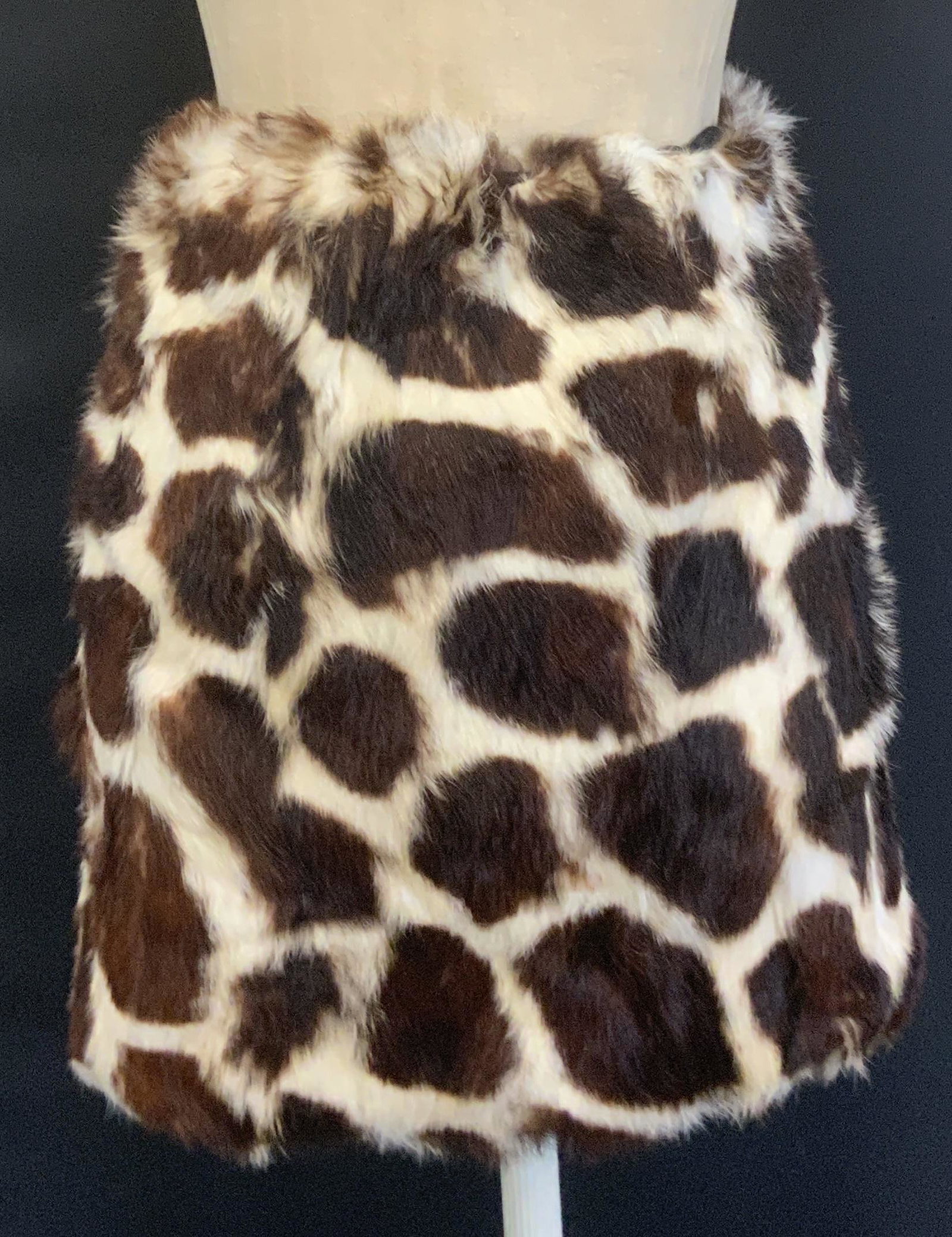 Pair of Plush Animal Print Skirts NWT: Pair of Plush Animal Print Skirts, 1 giraffe print NWT, elastic waistband, measures approx 15 x 12 in., 1 leopard print with zip closure, size 8. Plush animal print skirts, ladies animal print clothin