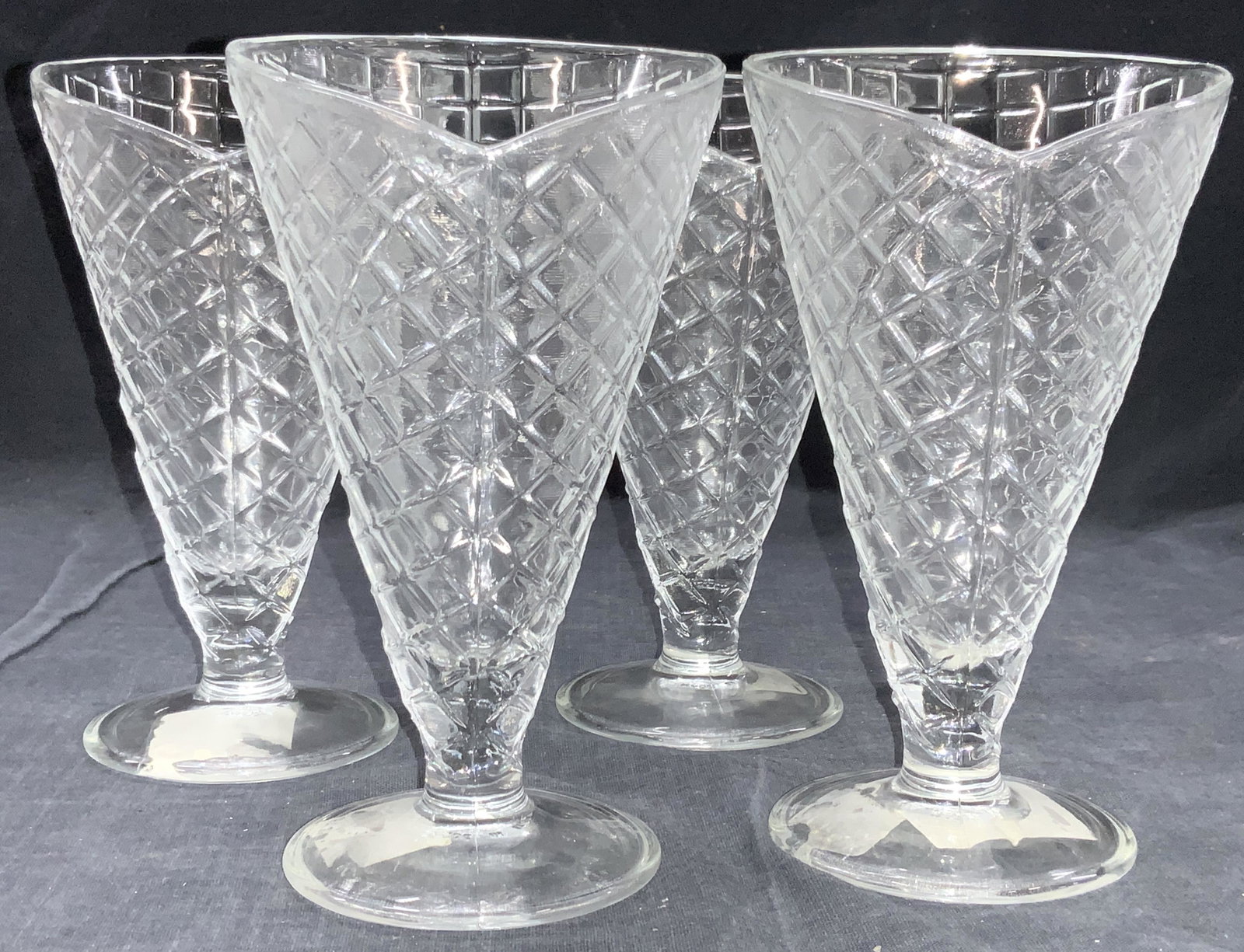 BORMIOLI ROCCO 4 Waffle Cone Glasses: 4 set of molded waffle cone footed glasses. Approximately 6.5 inches tall. Marked on underside sticker BORMIOLI ROCCO. Bormioli Rocco waffle cone glasses, ice cream glasses, glasses, vintage glasses, 