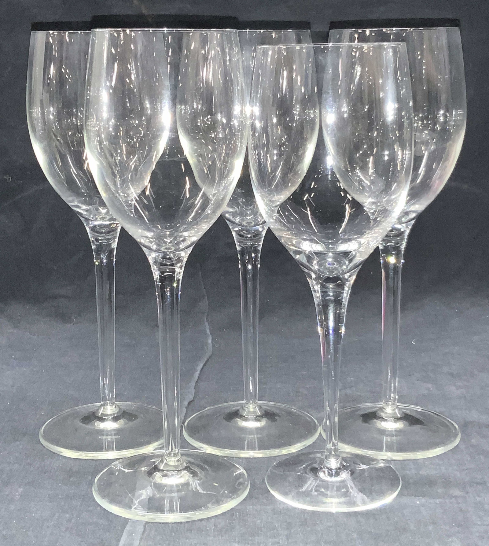 5 Vintage Clear Crystal Stemwares: 5 vintage clear crystal stemware glasses with clear glass stems. 4 are approximately 8.75 inches tall and 1 is approximately 8.25 inches tall. Crystal stemware, crystal wine glasses, wine glasses, cry