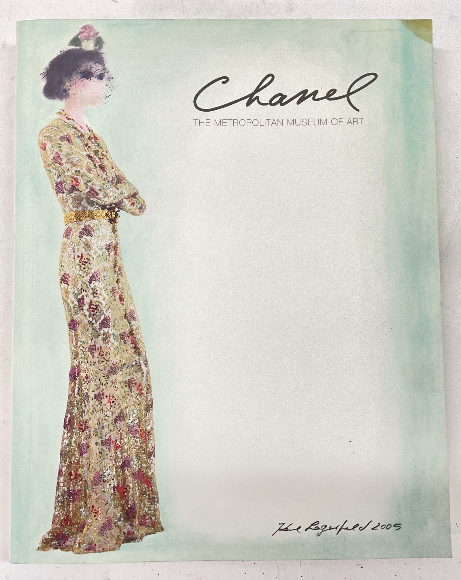 Book, CHANEL the MET, Copyright 2005: Chanel, The Metropolitan Museum of Art Book. Copyright 2005. Measures approx 9 3/4 in by 12 1/4 in. Some staining to piece present. Chanel designer, The Metropolitan Museum of Art, Chanel clothing, Ch