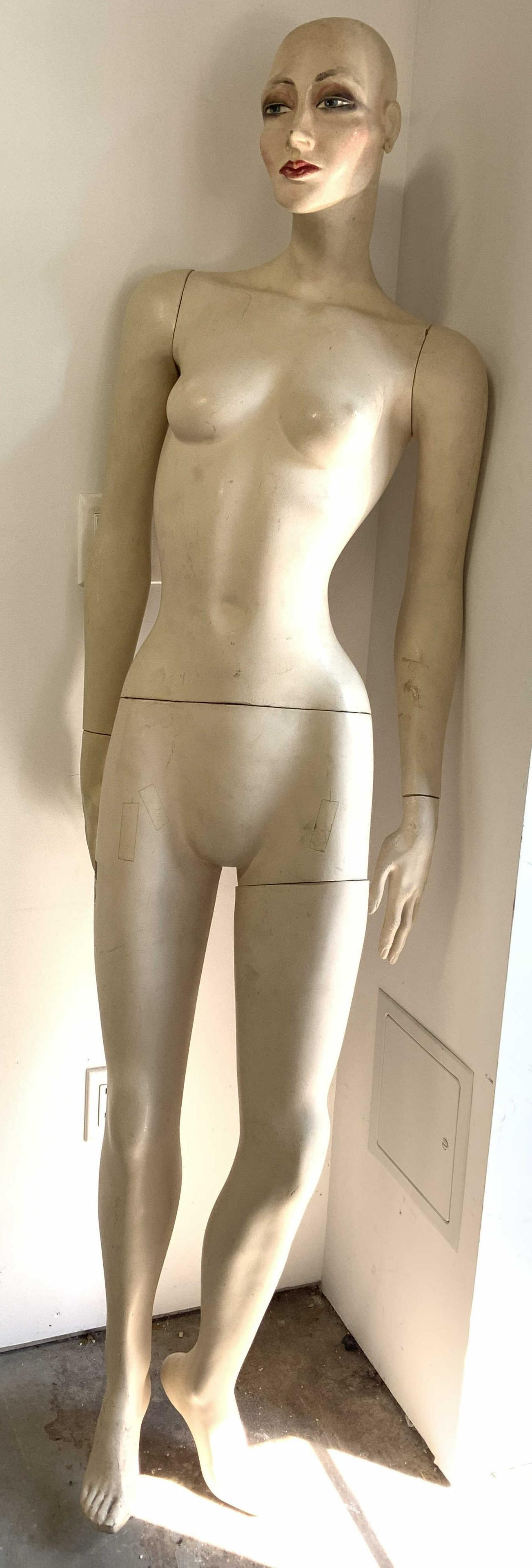 Life Sized Vintage Fiberglass Mannequin 71inH: Mannequin is vintage. Piece appears to be fiberglass possibly plastic. Measures approx 71 inches tall 16 inches wide 11 inches deep. Piece has evident marks, wear. Mannequin, fiberglass Mannequin, vin