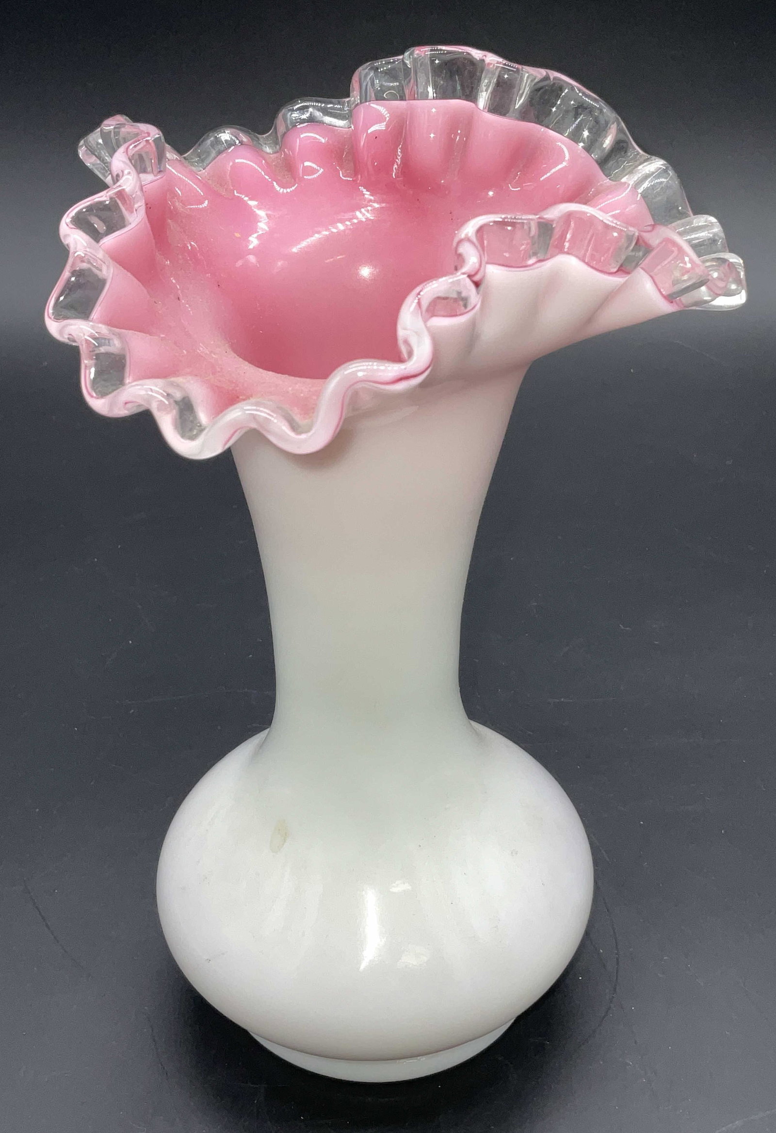 Ruffled Fenton Art Glass Vessel: Ruffled Fenton Pink Art Glass Vessel. Possibly Fenton, no label or mark to indicate. Measures approx 8.25H x 5W inch. Ruffled glass, handkerchief glass, pink art glass, Fenton, Fenton style, art glass