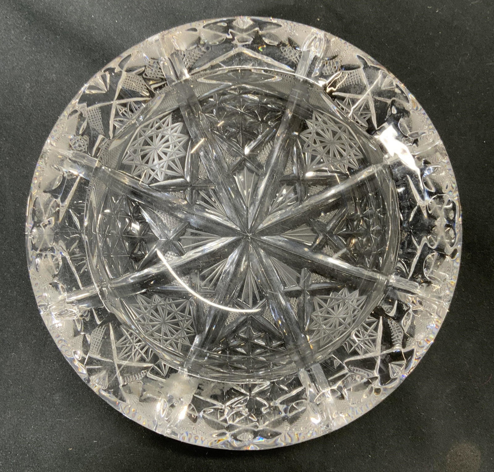 Vintage Thick Cut Art Glass Ashtray: A vintage thick cut art glass ashtray with ornate etched decoration. Measures approx. 6 inches diameter. Some wear to surface consistent with age and exposure. Ashtray, glass ashtray, vintage ashtray,