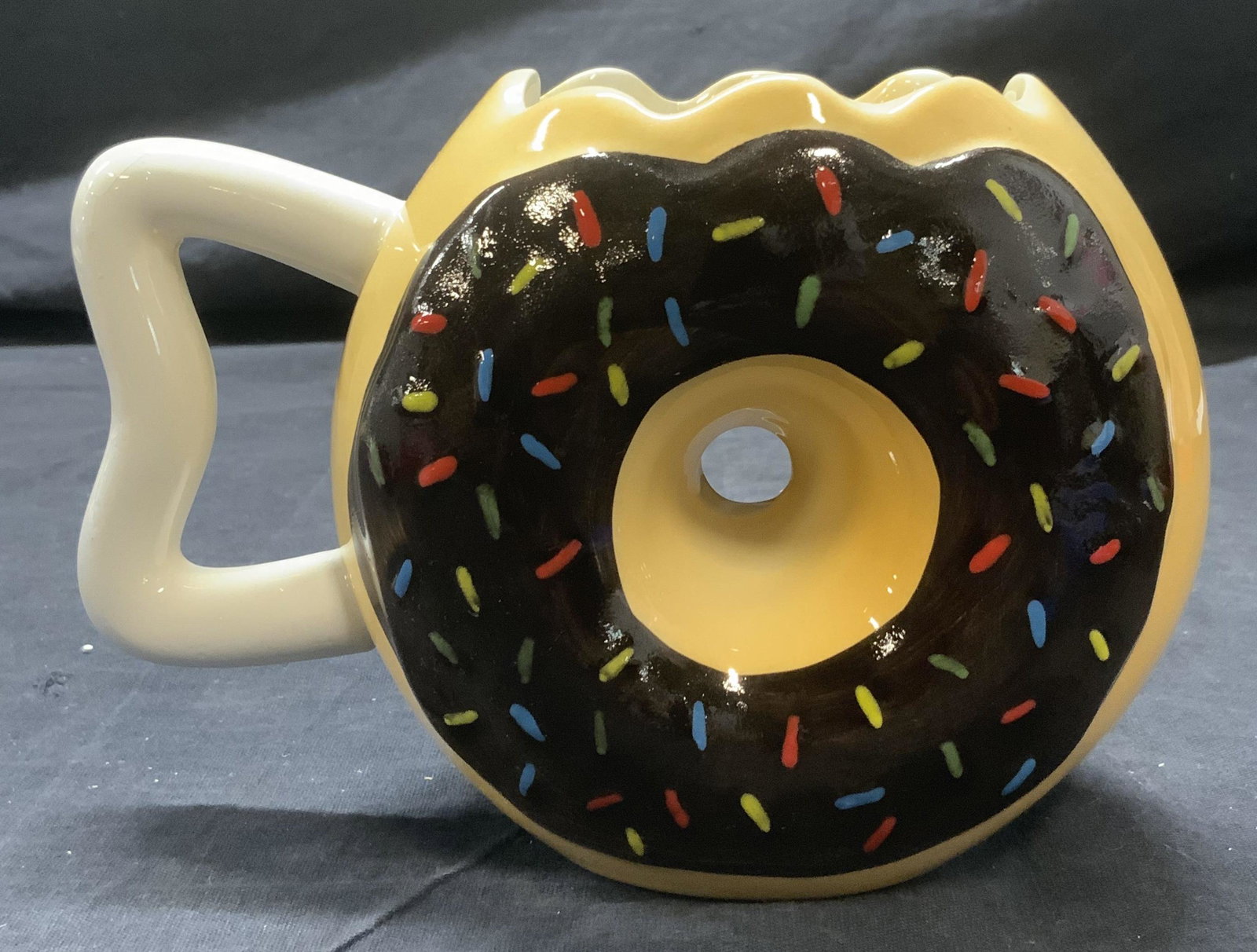 BIGMOUTH Inc Ceramic Donut Mug: BIGMOUTH Ceramic Donut Mug, verso stamped bigmouth Inc., ceramic mug with hole in center, measures approx 5 x 7 in. Bigmouth ceramic donut mug, donut mug, unique mugs, coffee mugs, coffee cups, dining