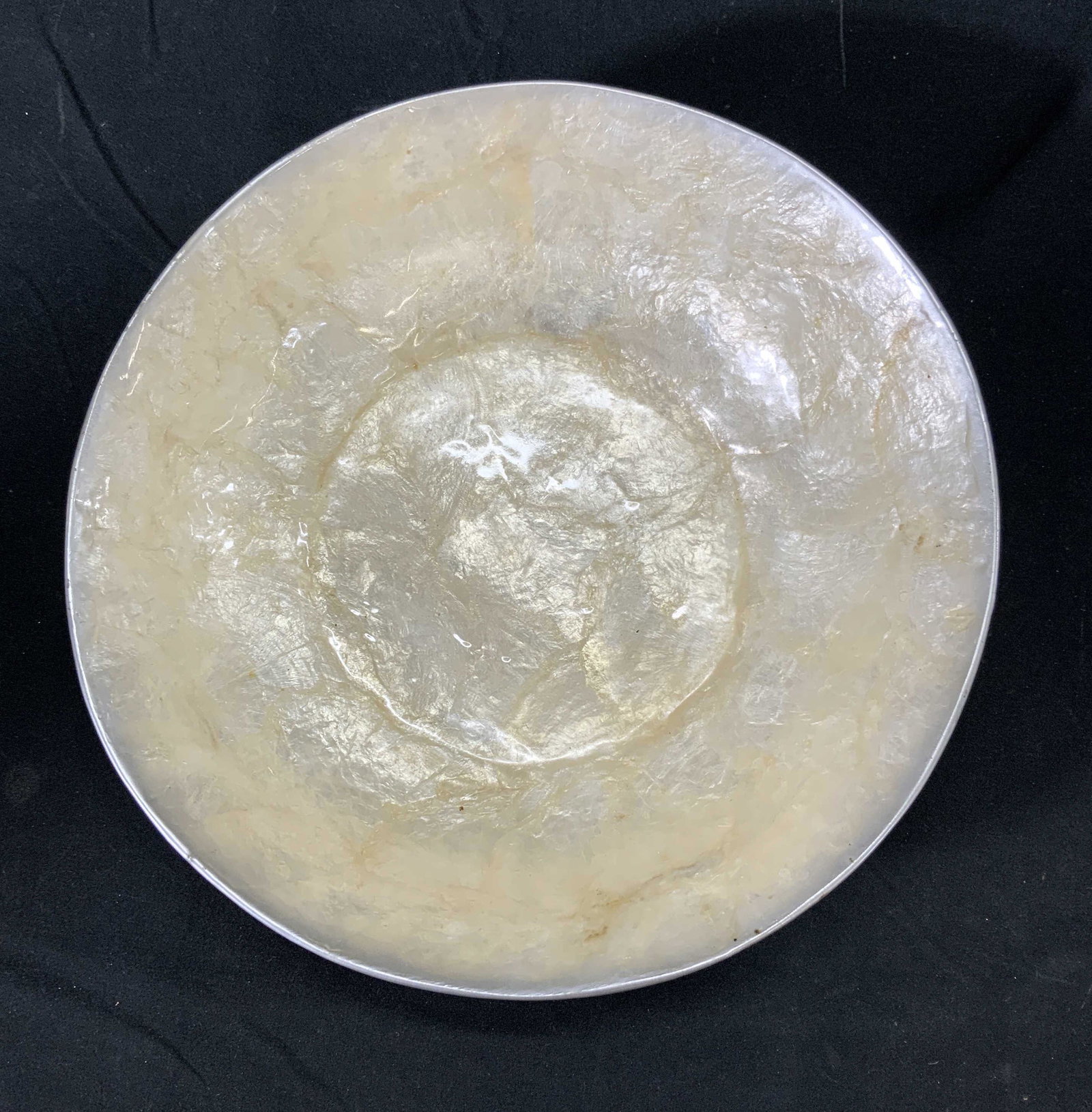 ZEN GARDEN & HOME Mother of Pearl Bowl: Zen Garden & Home mother of pearly bowl. Trademarked to underside. Handmade in Indonesia. Some wear consistent with exposure. Measures approx, 9.5 inches diameter and 2.5 inches tall. Zen home and gar