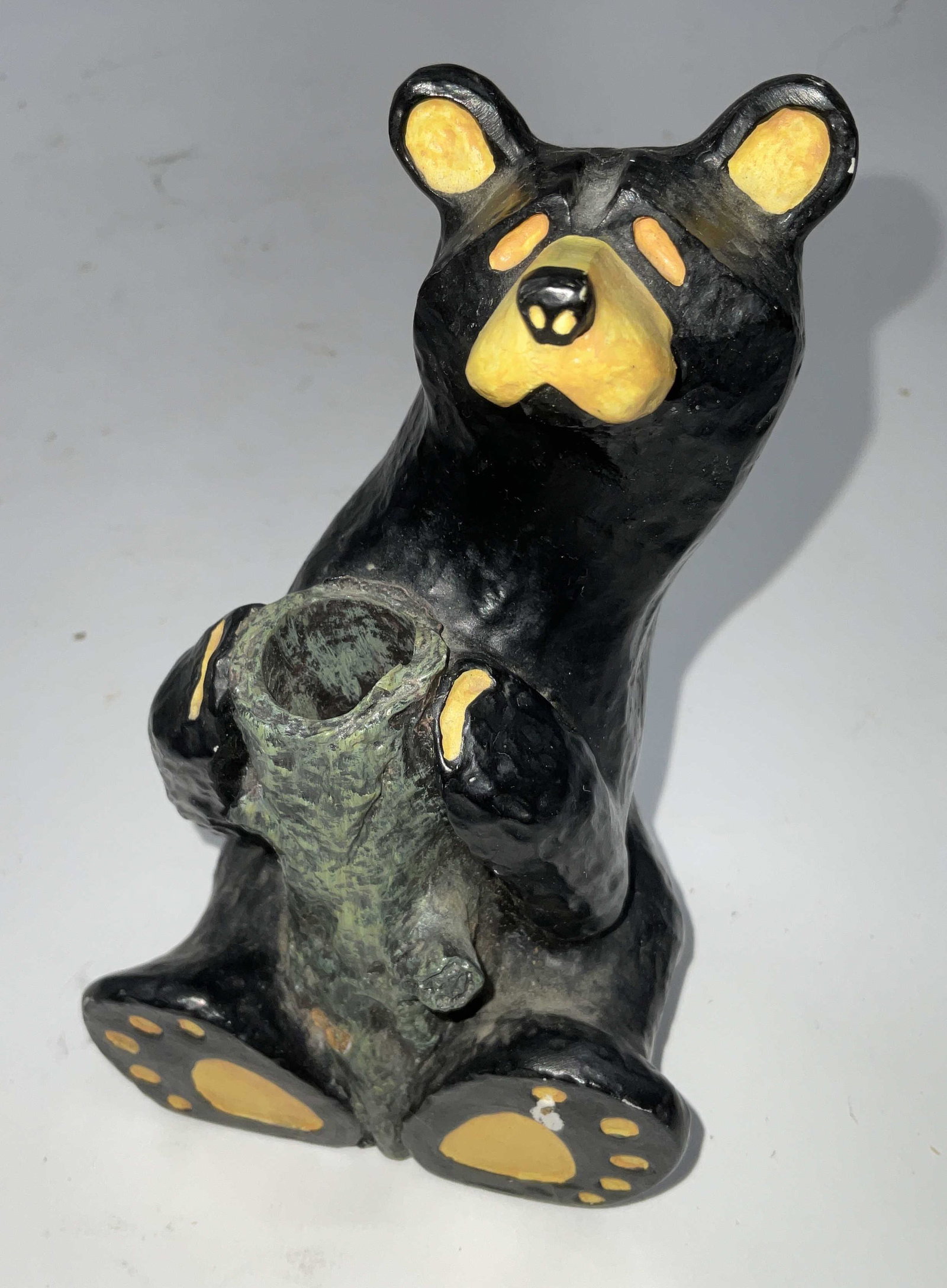 Jeff Flemming Bear Foot Tabletop Decor, Montana: Bear Motif Tabletop Decor. Measures approx 5.75 x 3.75 inches. Minor wear to piece. Peeling of color to foot. Labeled on bottom, bear foots, by Montana artist Jeff Flemming. Bear, bear Figural, bear h