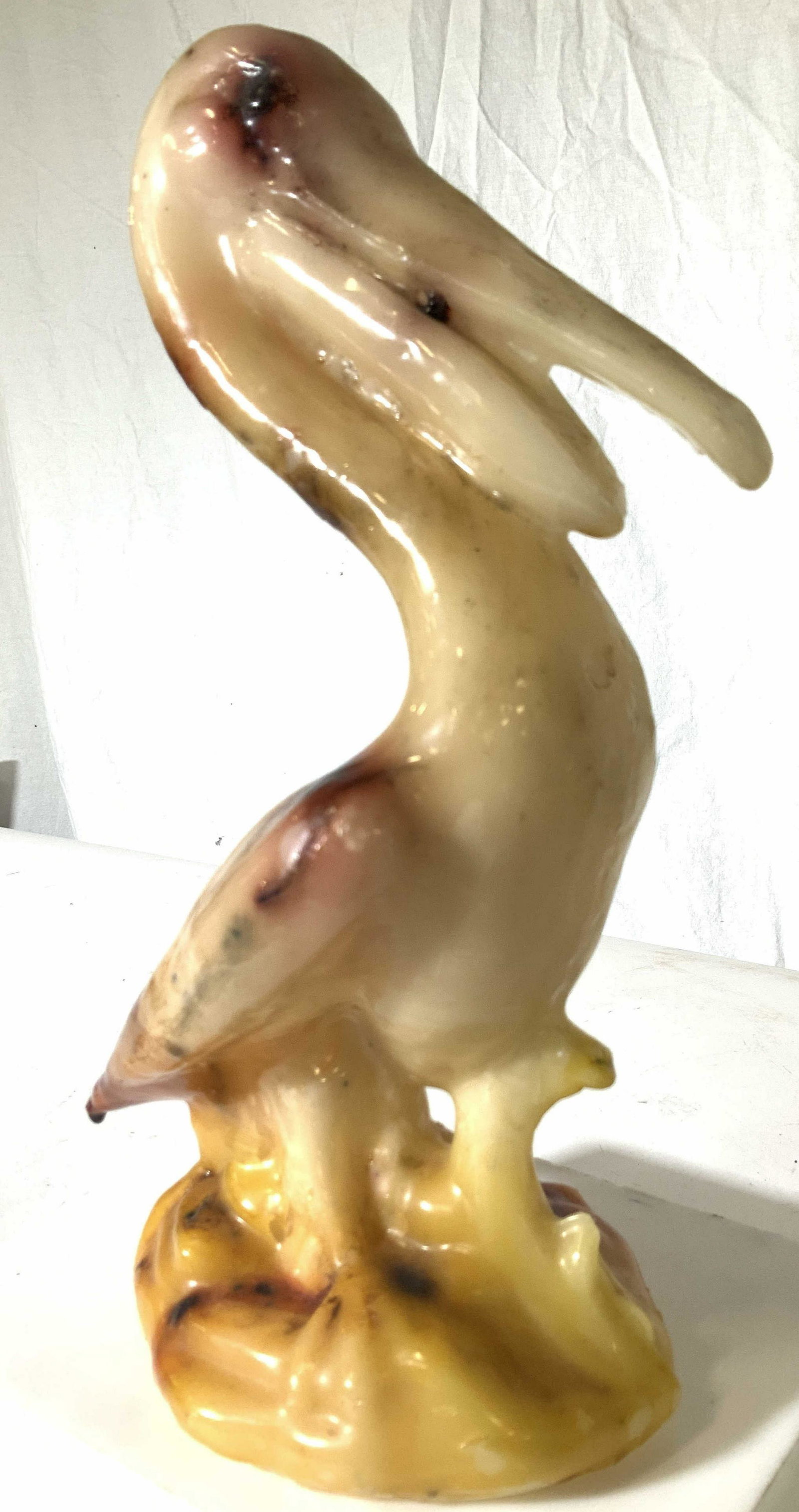 Vintage Wax Pelican Figural: This is a large wax standing pelican, measures 11.5 in. Ht. 6.5 in. W Appears to have been originally a candle. Wear to finish and surface of wax. Hunters use a wax figural to remove feathers ( diffic