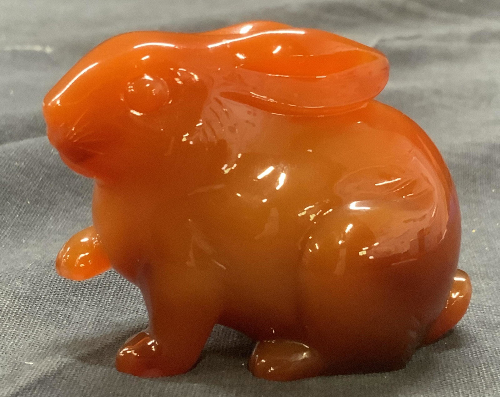 Polished Carnelian Stone Rabbit Figurine: Polished Carnelian Stone Rabbit Figurine, measures approx 2 x 3 in. Polished carnelian stone rabbit figurine, natural stone decor, natural stone figurine, carnelian, carnelian rabbit, polished carneli