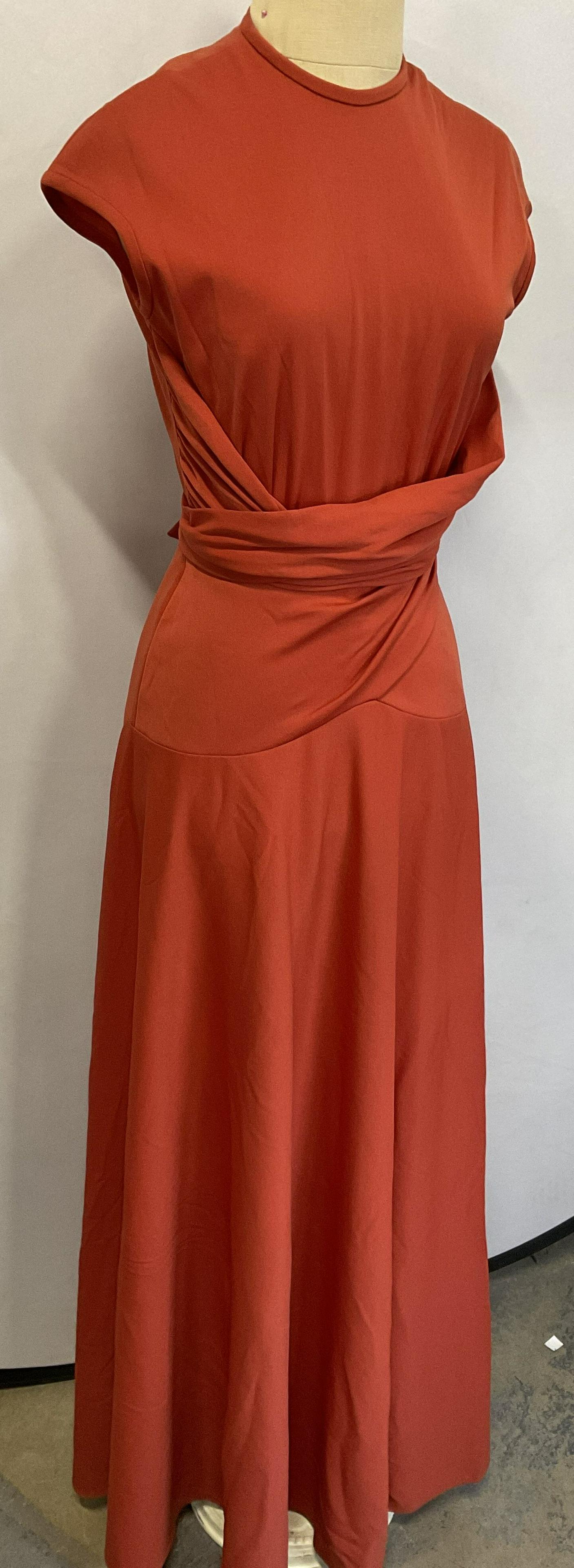 Union Made Elegant Ladies Maxi Coral Dress: Union Made Elegant Ladies Maxi Coral Dress. Minor stain to piece. High neck with zipper back closure with waist tie to front. Length of dress from waist down measures approx 44 inches. Waist measures 