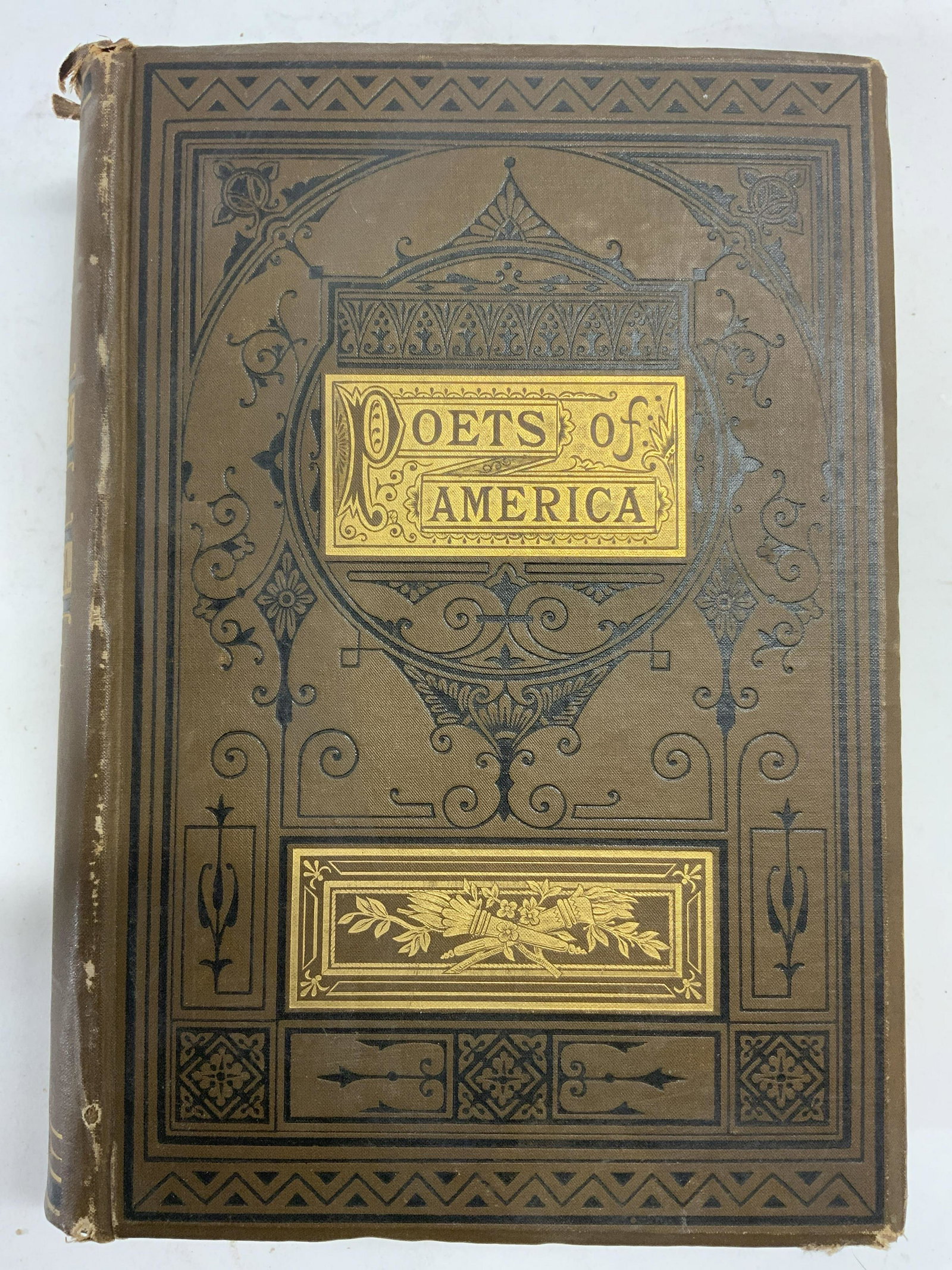 Antique POETS OF AMERCA BY RUFUS GRISWOLD: Page reads PORTS AND POETRY OF AMERICA BY RUFUS WILMOT GRISWOLD NEW YORK JAMES MILLER PUBLISHER, 779 BROADWAY. Reads ENTERED ACCORDING TO ACT OF CONGRESS IN THE YEAR 1872 Book appears to be antique. P