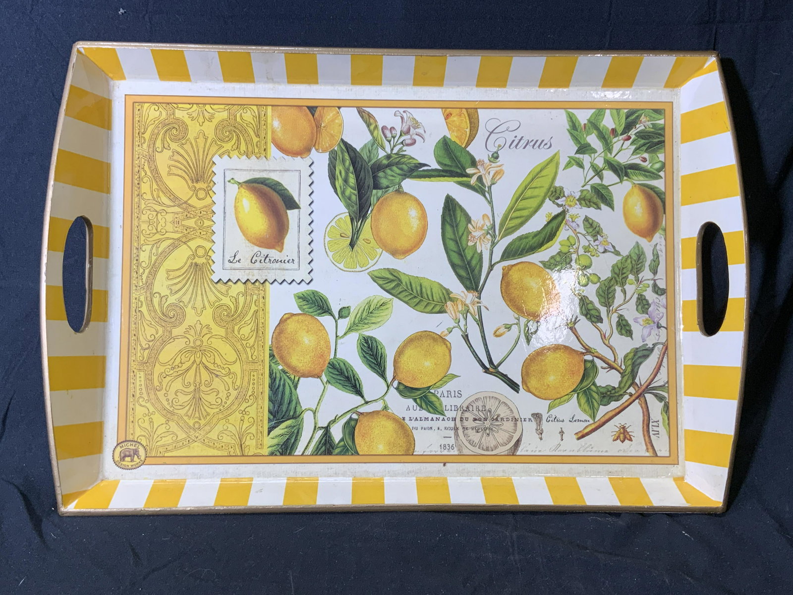 Vintage Yellow Lemon Motif Tray: A vintage yellow tray with lemon motif. Material feels like wood. Felt to underside. Measures approx. 20 x 13.5 inches. In good condition, some surface wear consistent with exposure. Tray, lemon tray,
