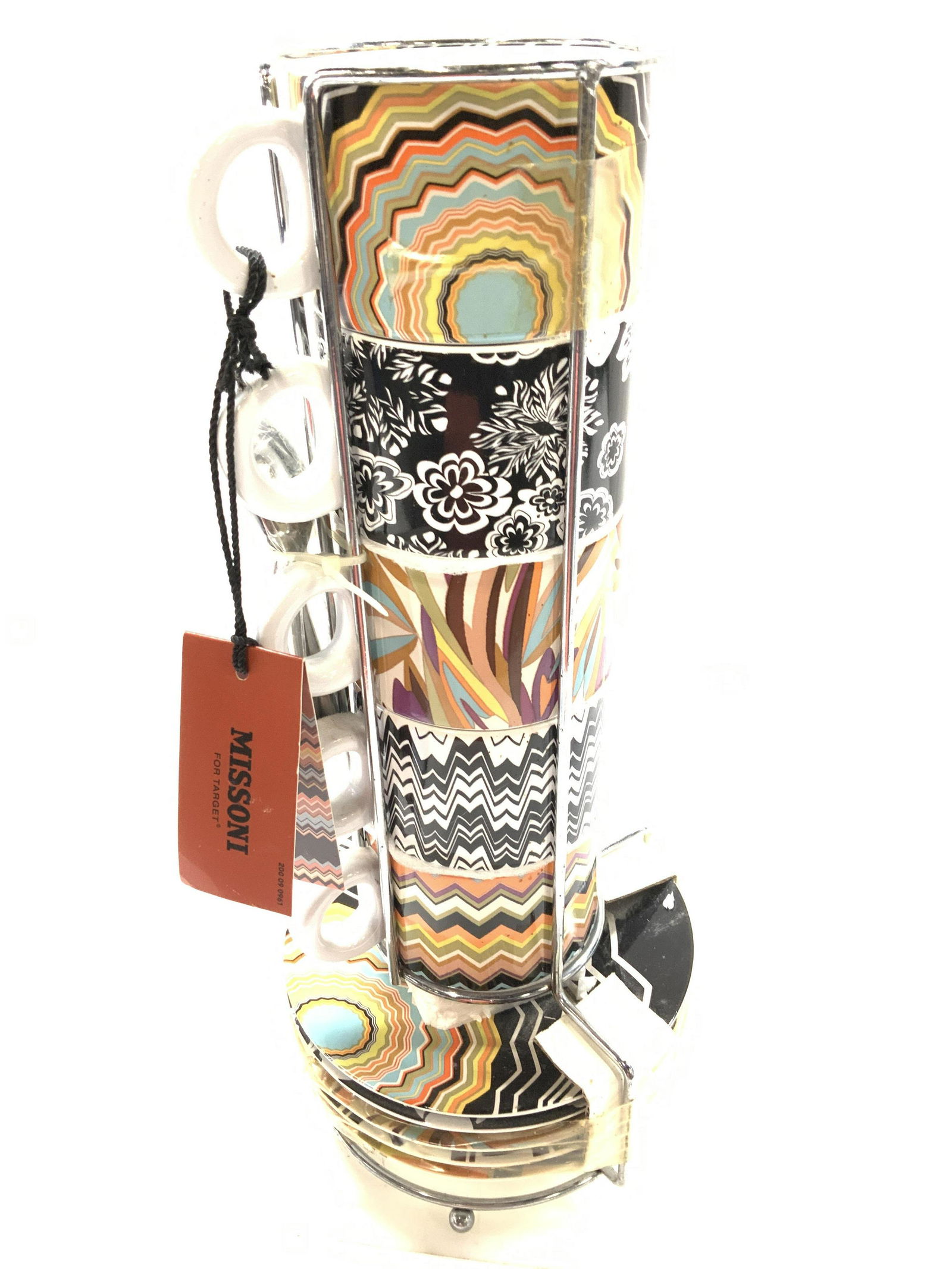 MISSONI Porcelain Mug and Plate Set 15 NIP: MISSONI Porcelain Tableware set in chrome stand. Matching Espresso cups and plates, with demitasse spoons in original packaging . New old stock. Multi patterns and colors. Plates 6 in. Cups 3.5 x 2 in