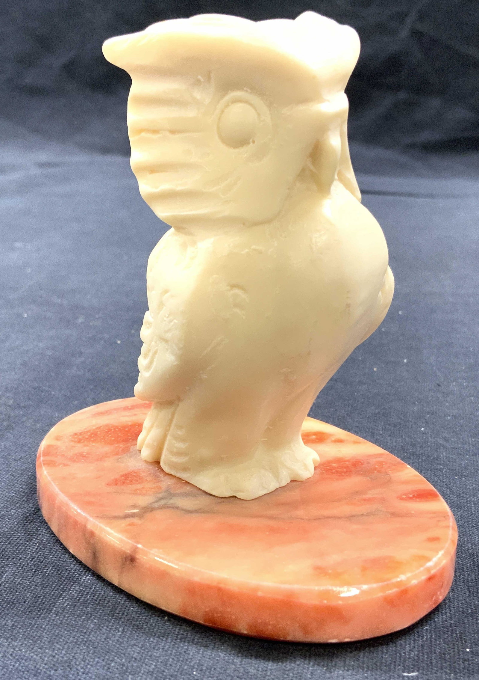 HAND CARVED GENUINE ALABASTER Owl Figure: Underside has tag which reads HAND CARVED GENUINE ALABASTER MADE IN ITALY. Piece has Oval shaped salmon toned base, owl figure is cream toned. Piece measures approx 3.5 inches tall 3.25 inches deep 2.