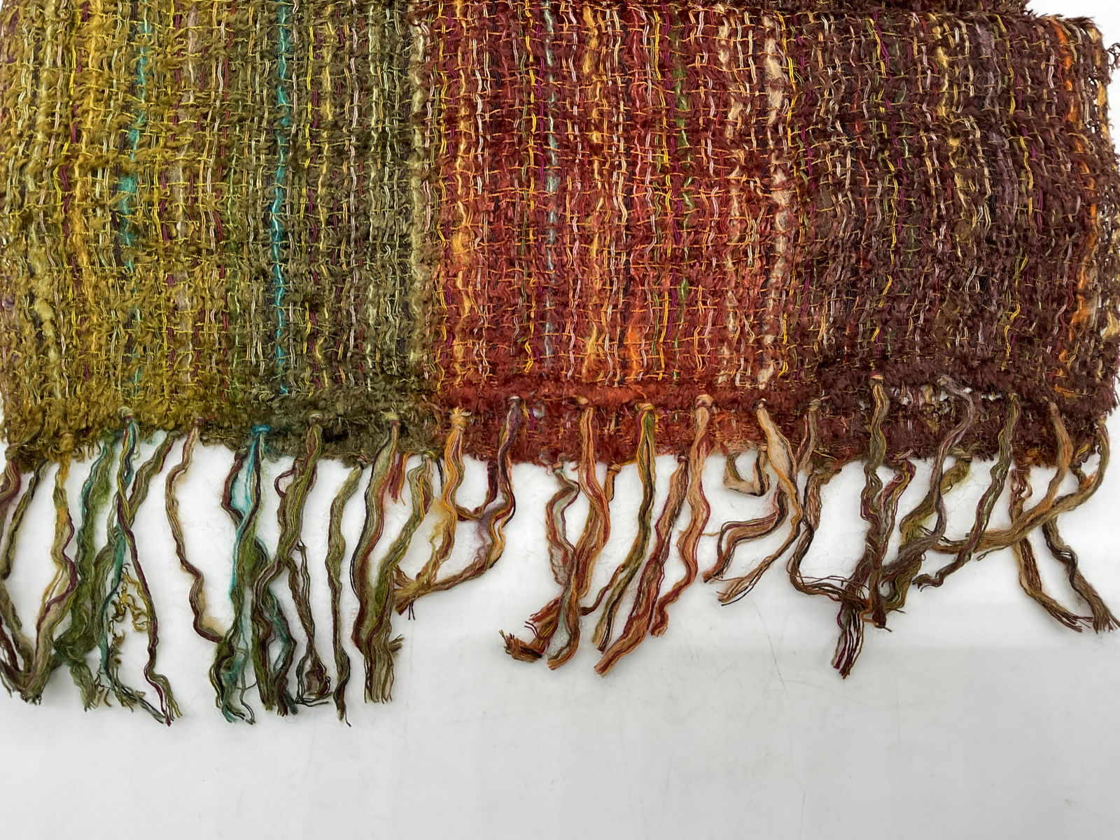 Autumn Toned Fringed Scarf: Autumn Toned Fringed Scarf. Measures approx 66 inches. Fringed to bottom. Minor pulling to thread present. No name of material label to piece. Soft hand touch. Womens scarf, fall fashion, fall wearabl
