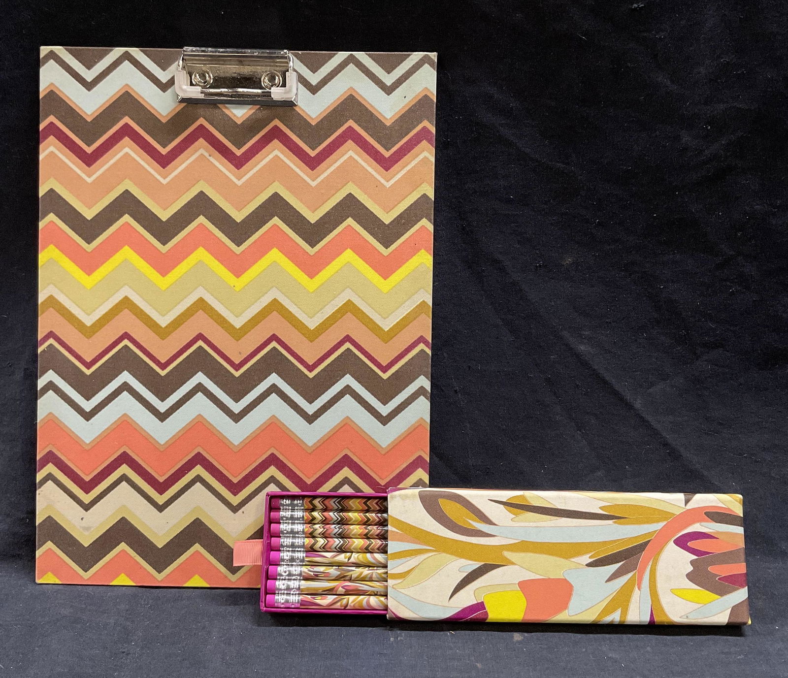 Missoni Style Textile Clipboard & Pencil Case: Missoni style Textile Clipboard & Matching Pencil Case. Both pieces are cover in a fabric cover. Pencil case opens up to 8 unused pencils. Surface wear to piece, some staining present to clipboard. Cl