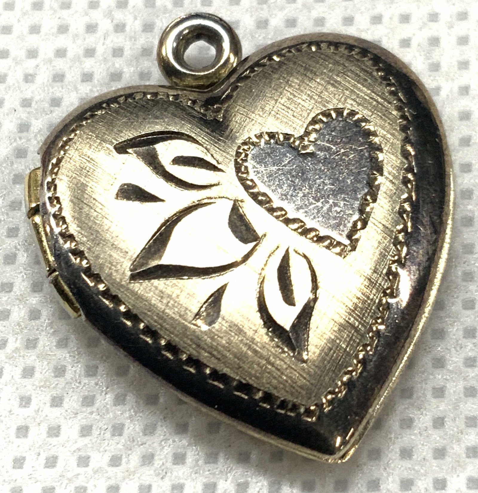 Vintage Sterling Etched Heart Pocket: Vintage heart shaped locket, etched on front with a heart with leaf etchings. Backside of locket is etched with the name Cecily. Tested positive for sterling using Puritest metal tester. Approximately