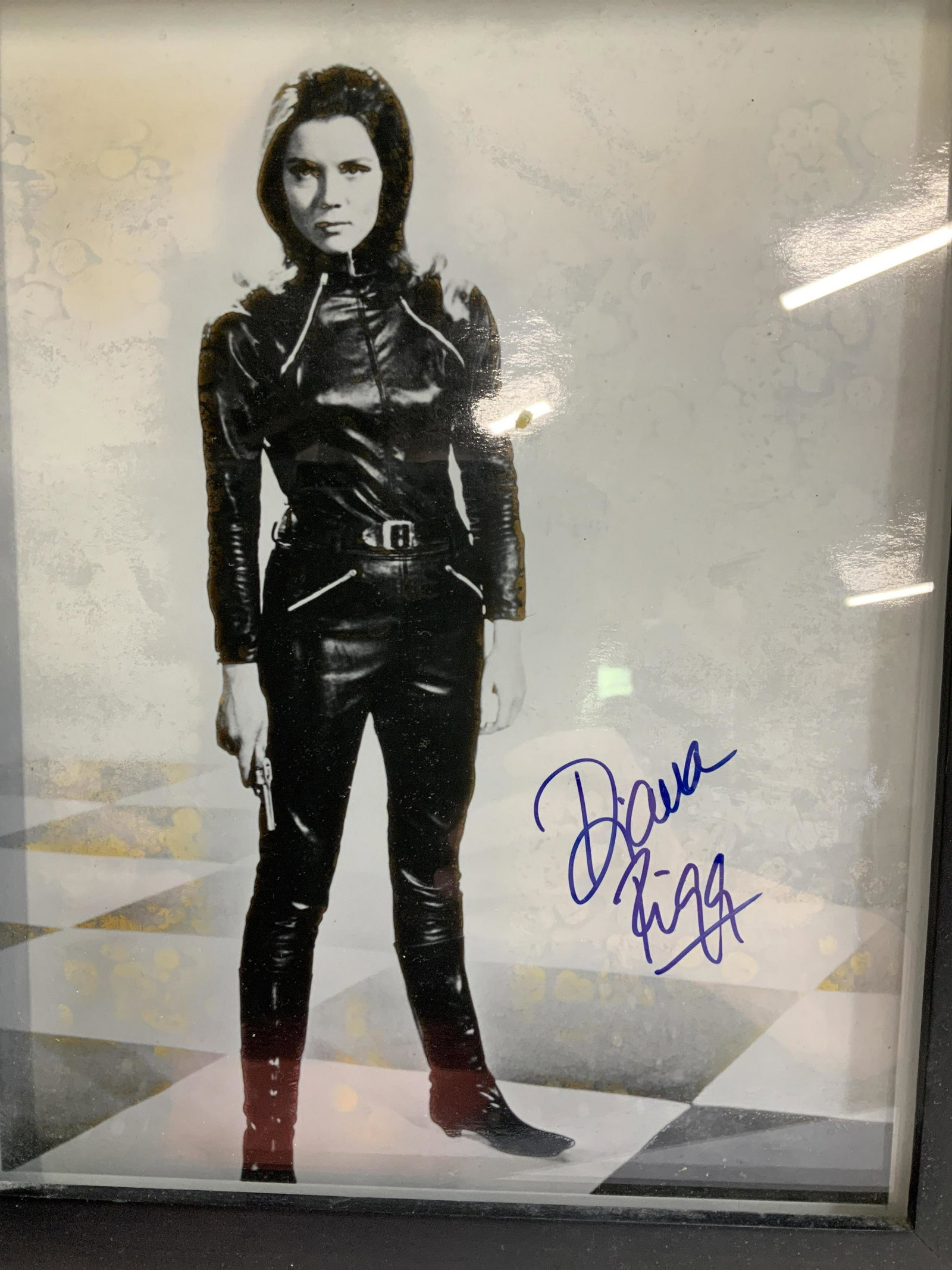 Signed Diana Riggs The Avengers Blk/ Wht Photo: Autographed Diana Riggs Photo from the show The Avengers. 8 x 10 in. Signed by hand in blue marker. In black frame easel-back frame from Pottery barn. Photo has not be removed nor inspected out of fra