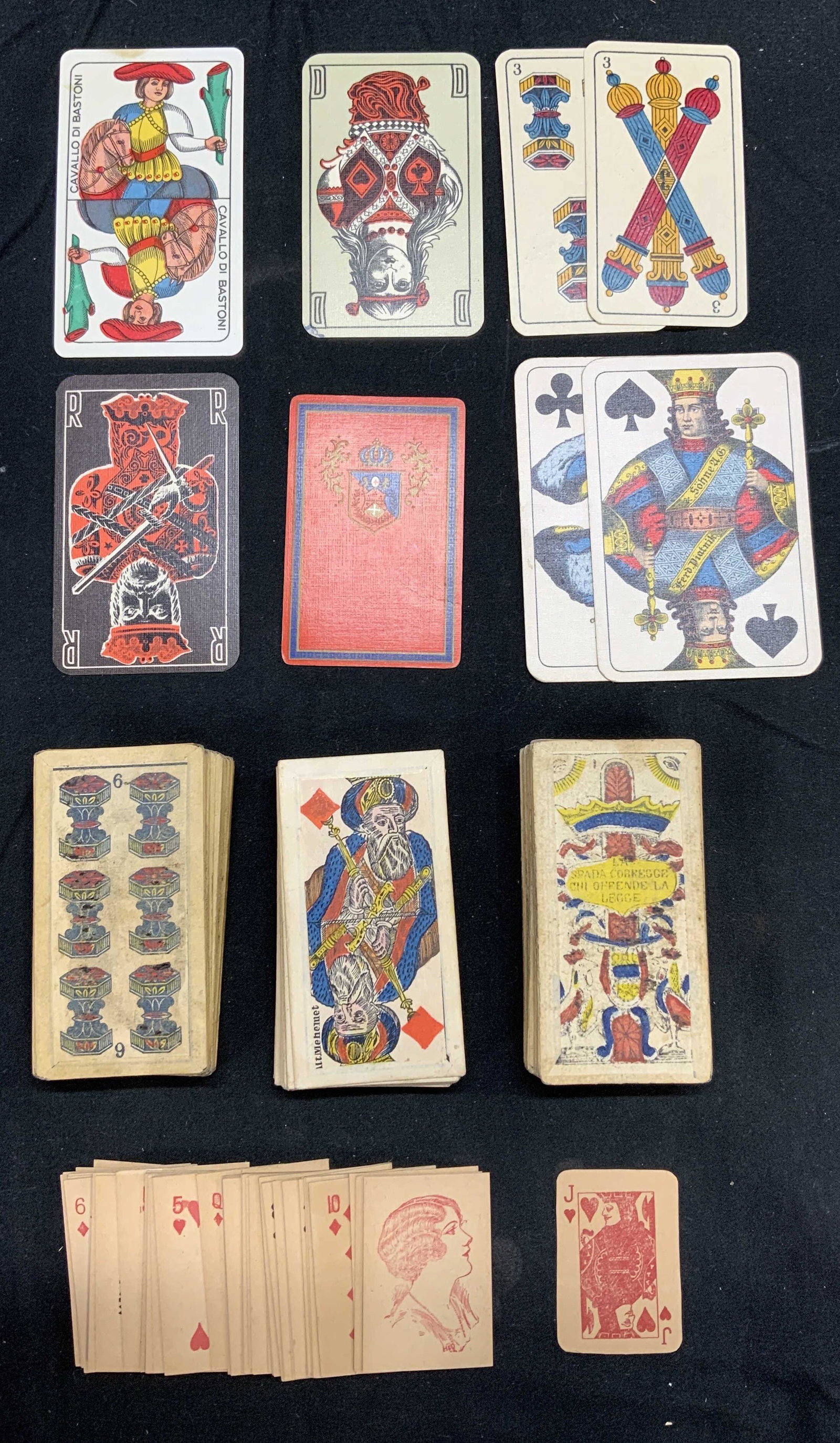 Group Lot Vintage Italian Playing Cards: Group lot of vintage Italian playing cards. 1 deck of miniature cards. 3 decks of illustrated cards. Group of mismatched cards. Decks not inspected for full sets. All cards have some wear consistent w