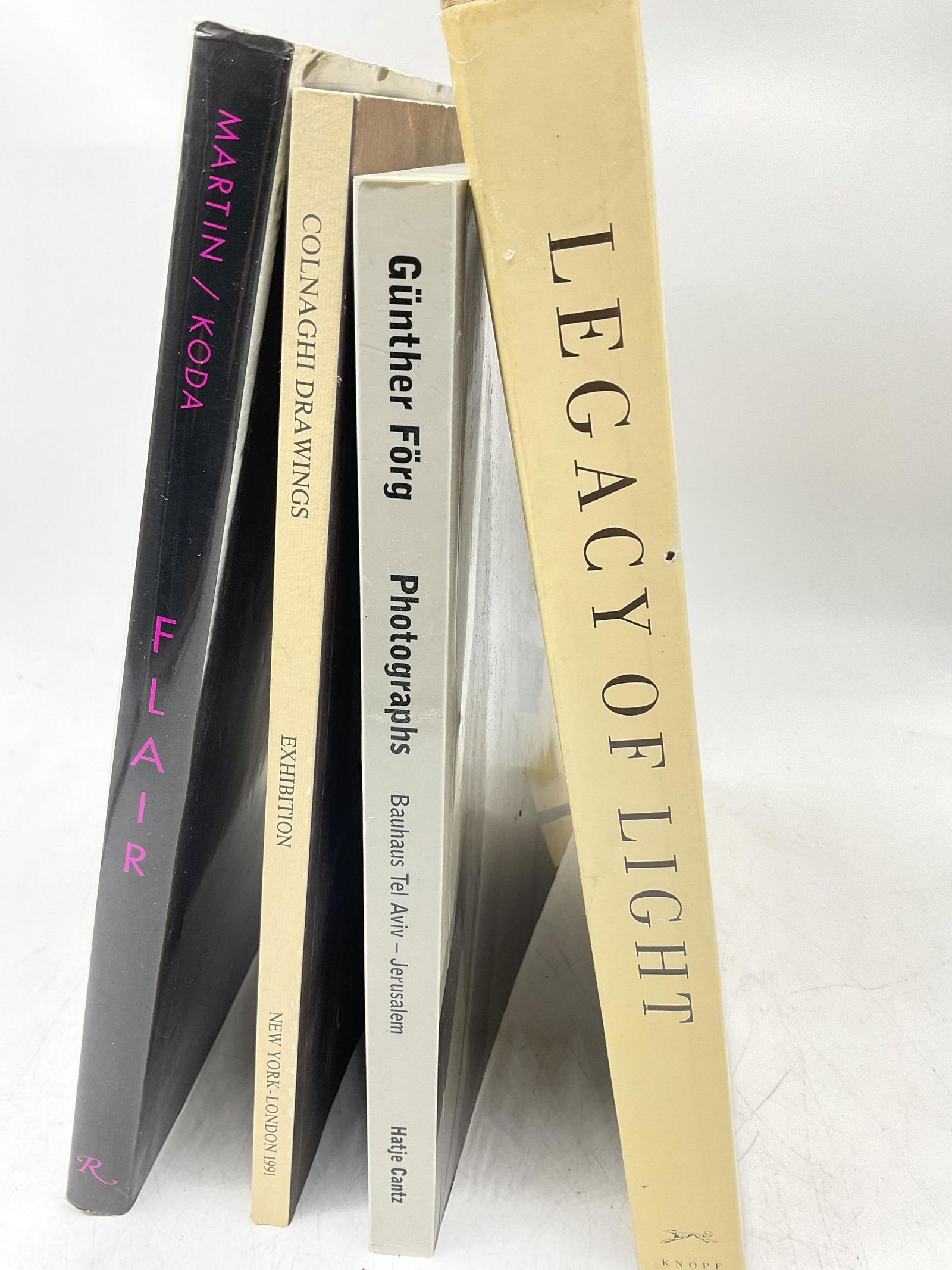 Lot 4 Art, Fashion and Photography Books: Lot 4 Art, Fashion and Photography Books. Titles include, Flair copyright 1992, Colnaghi copyright 1991, Gunther Forg Photographs copyright 2002 & Lagacy of Light copyright 1987. Minimal wear to books