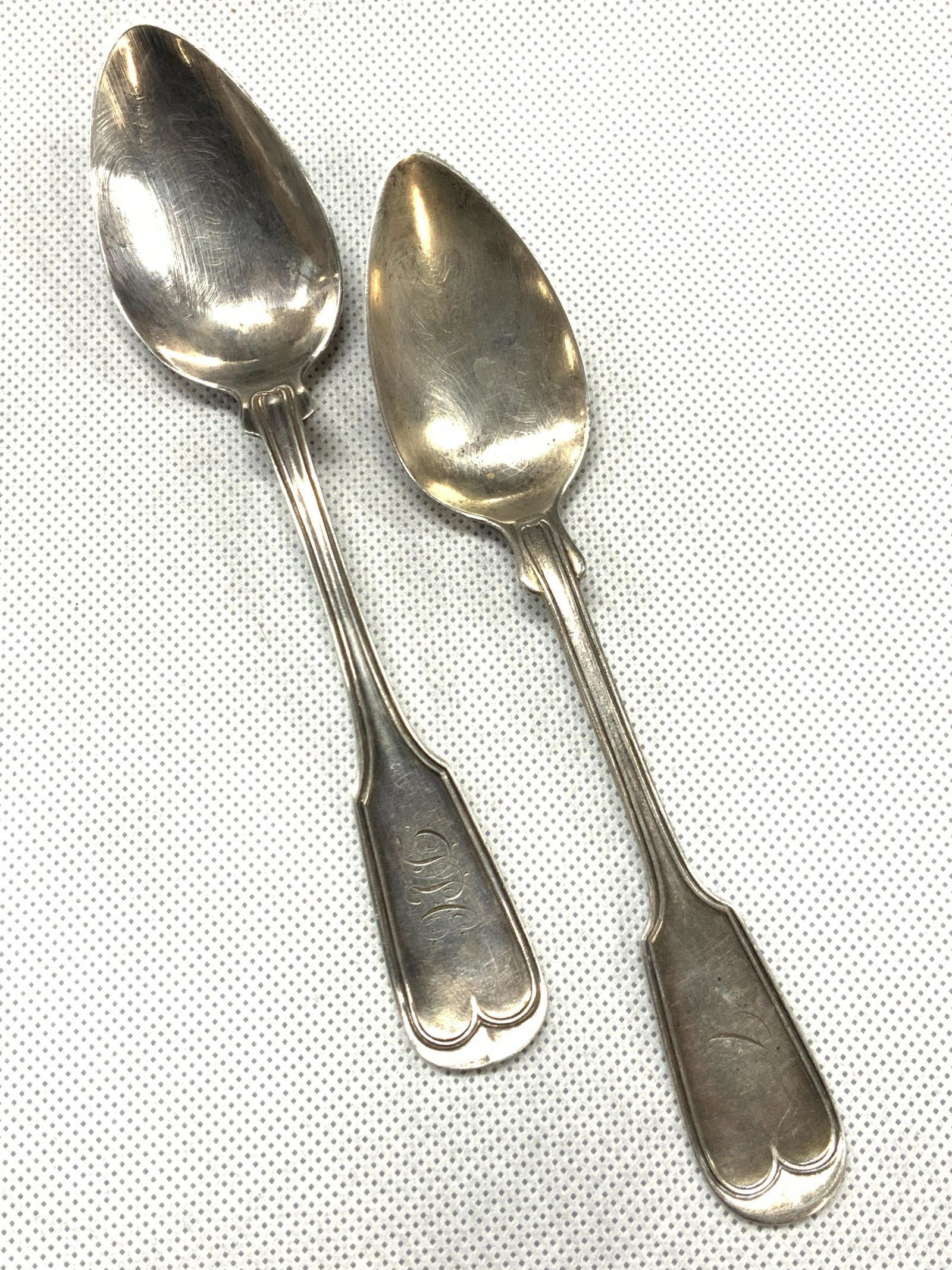 Lot2 Sterling Square & Brother & JB Runner Spoons: 2 vintage sterling silver spoons, monogrammed on handles with initials. 1 spoon is marked Square & Brother. Approximately 5.75 inches long. 1 spoon is marked J.B. Runner, approximately 6 inches long. 