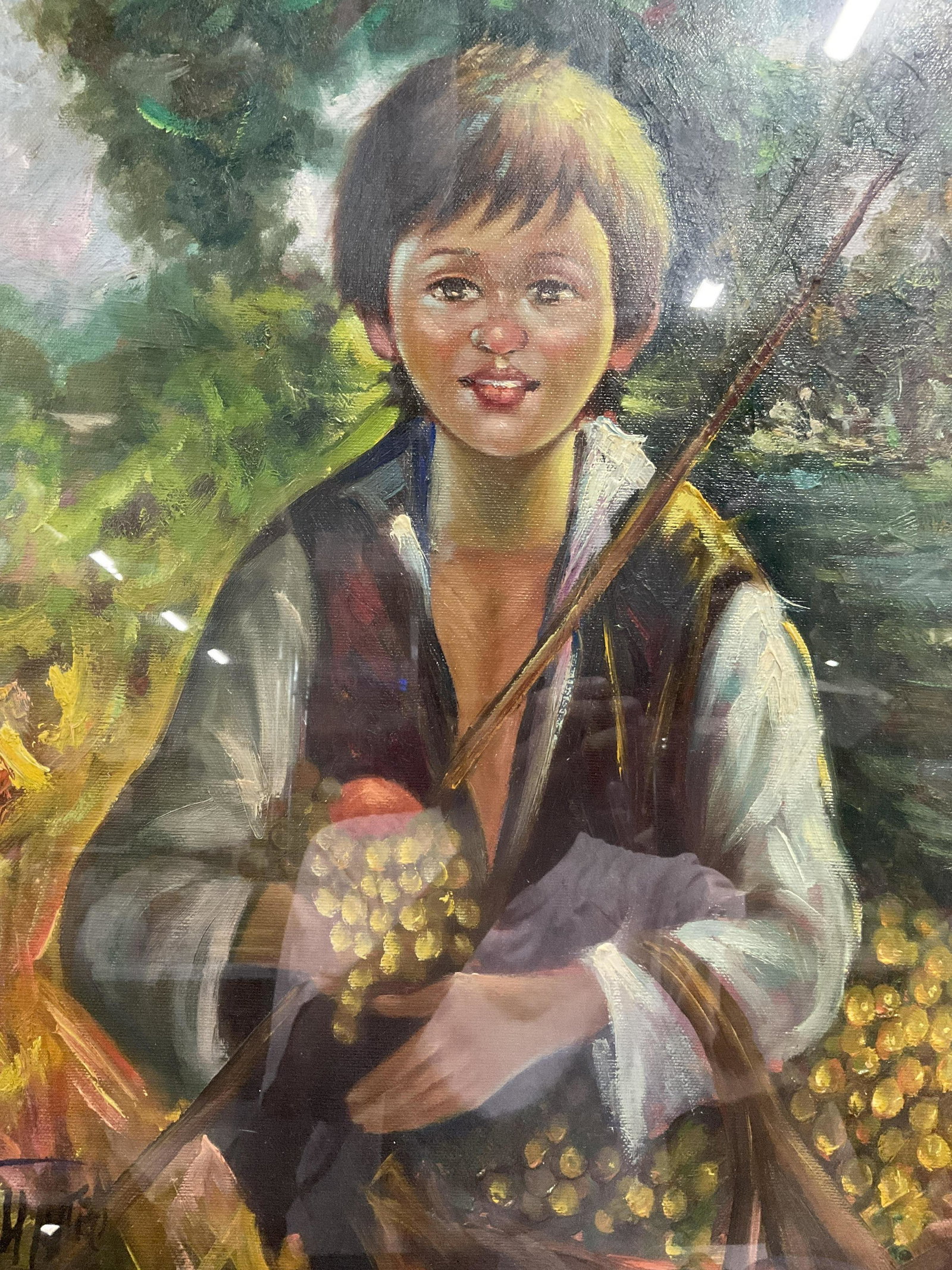 Signed Oil Painting of a Boy with Grapes: Signed Oil Painting of a Boy with Grapes, on canvas board, signature to lower left illegible, subject a boy carrying a basket of grapes, measures 30 7/8 x 27 1/8 inches, wooden frame, surface wear to 