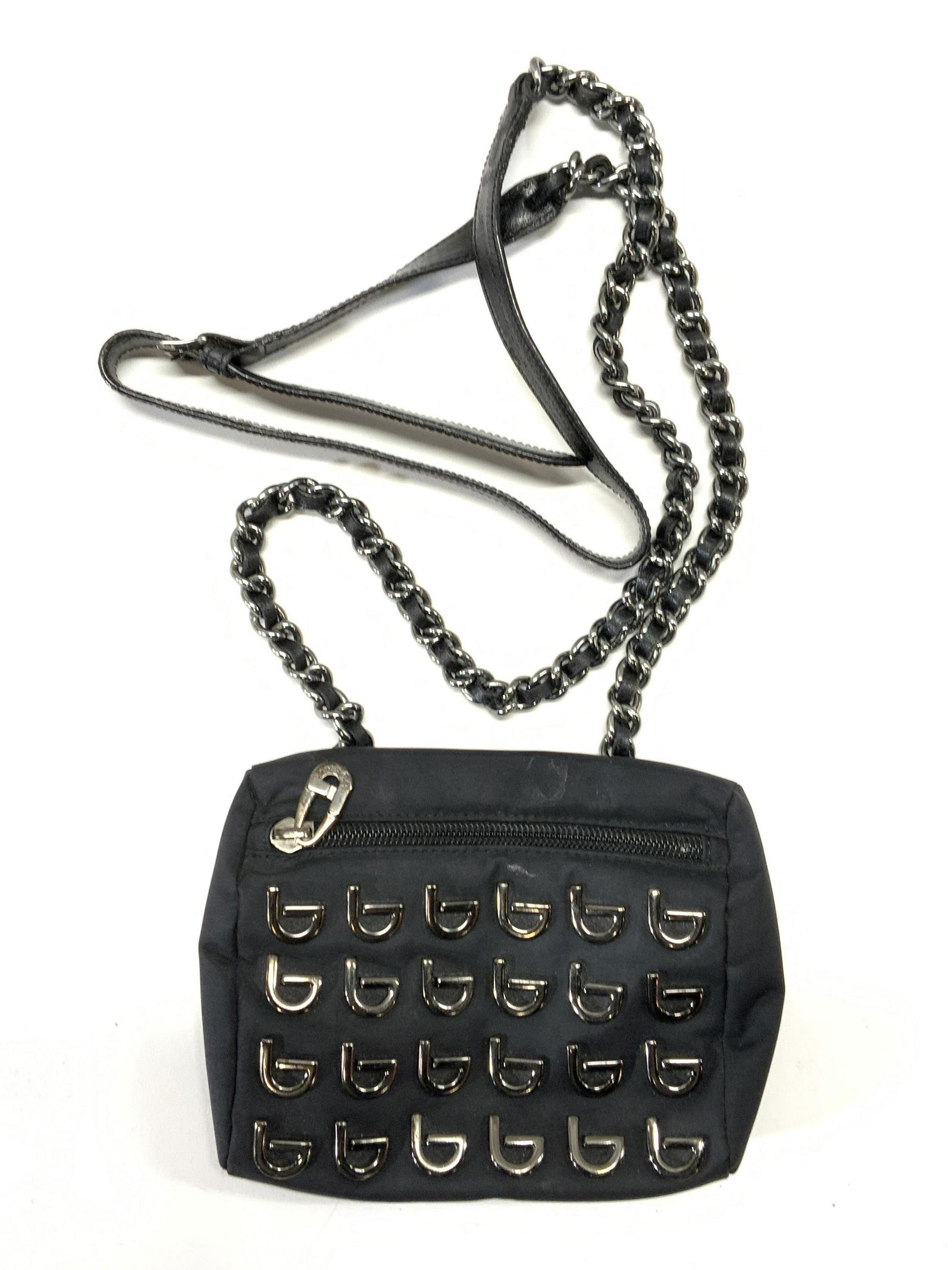 BYBLOS Vintage Black Crossbody Bag: Byblos vintage black crossbody bag. Designer logo to metal hardware on exterior and label to interior leather patch. Top zipper closure. Measures approx. 6 x 1.5 x 5 inches. Strap drop approx. 23.5 in