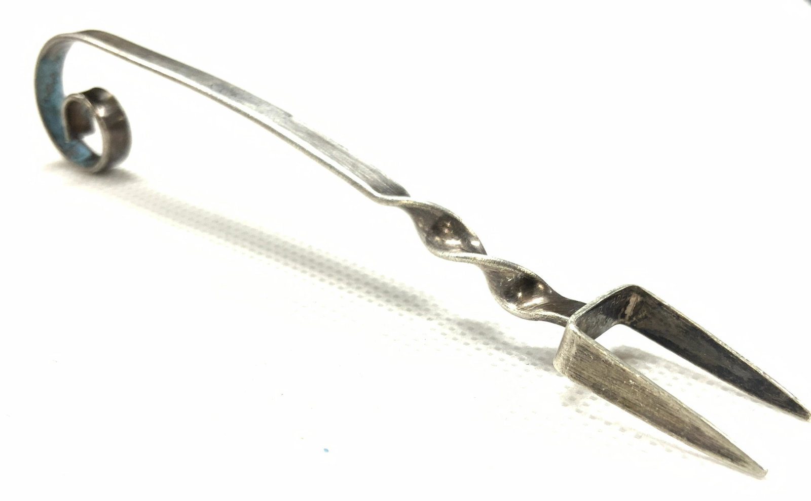 Vintage Hand Crafted Sterling Medieval Cutlery: Vintage medieval cutlery fork, made with two prongs on ends with twisted metal end and curled handle top. Marked, hand made Sterling. Approximately 4.25 inches long. Total weight 0.26 ozt. Condition i