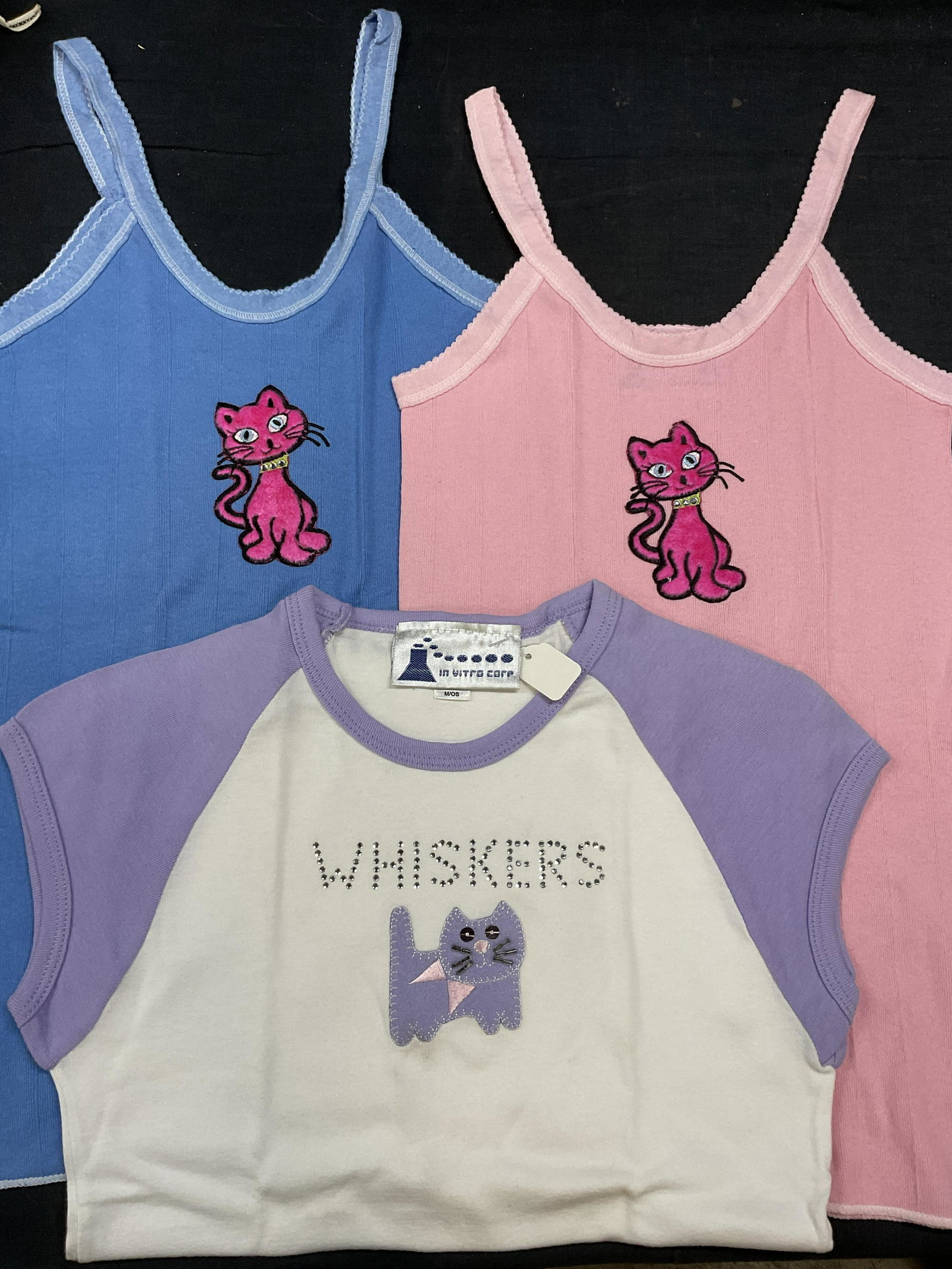 Lot Y2K Cat Motif Tops: Lot Y2K Cat Motif Tops. 2 Tank Top with pink cats to front. And 1 Sleeved shirt with purple cat & ‘Whiskers. Sized Small & medium tops. Tops, vintage, cat tops, tank tops, cat motif tops, Y2K tops, 