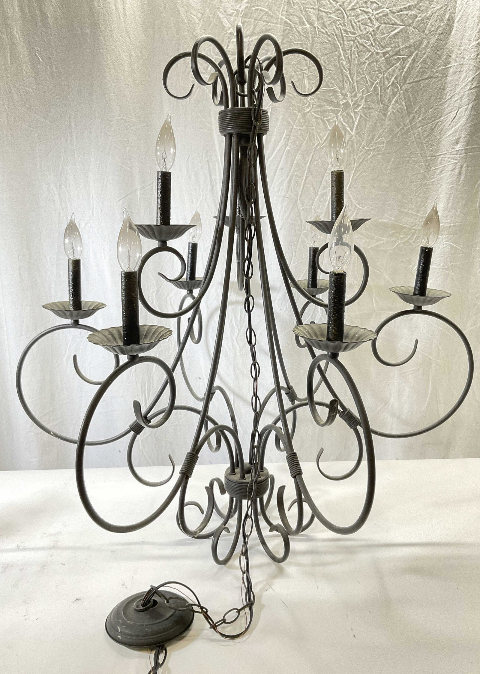 XL Metal 9 Armed Chandelier: Metal 9 Armed Chandelier. Not tested for functionality. Measures approx 37x 35 inches. Chain measures approx 43 inches. Arms to piece move Lighting, chandelier, country home decor, country home access