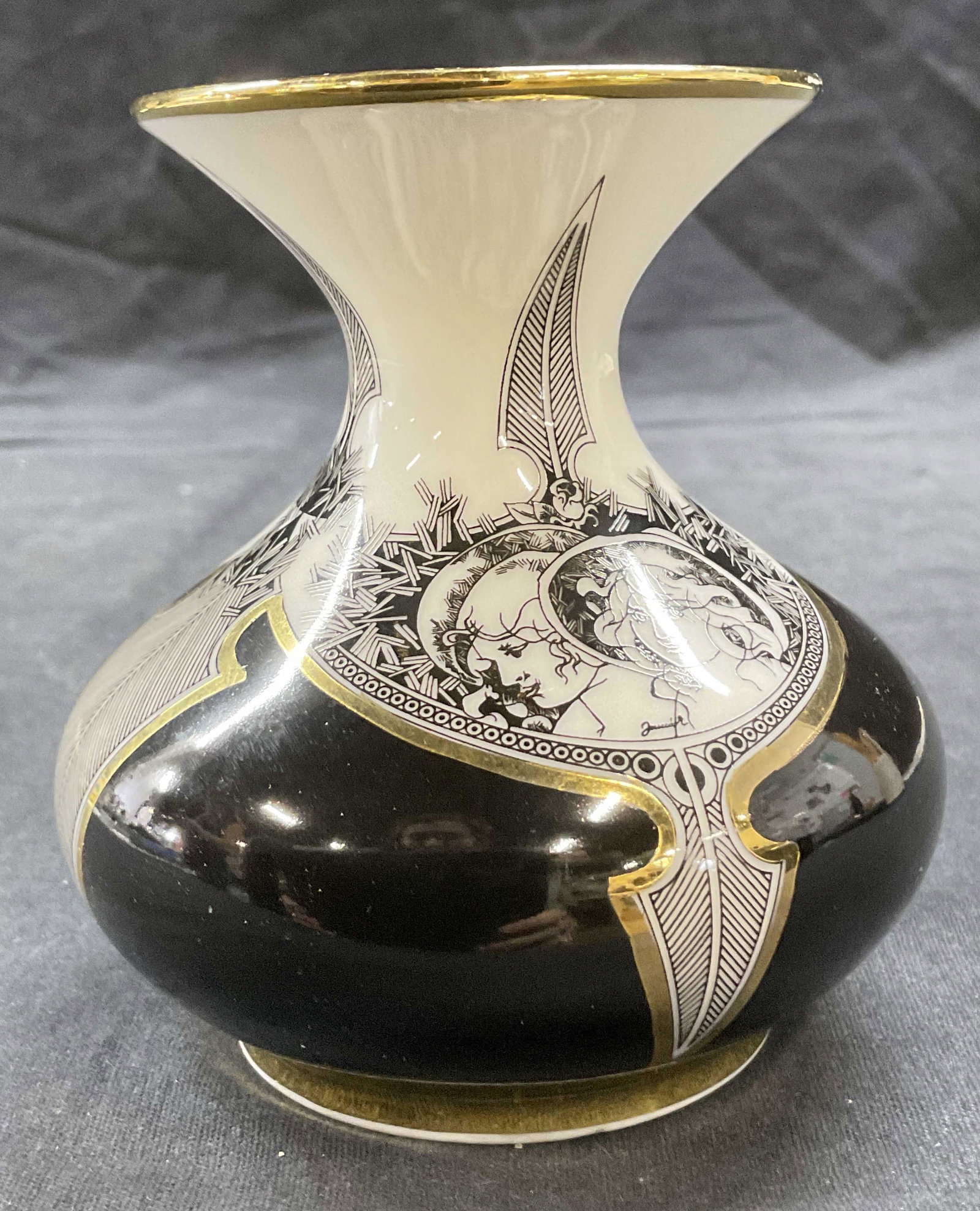 HOLLOHAZA Neoclassical Style Vessel, Hungary: Vintage HOLLOHAZA Neoclassical style Vessel. Labeled on bottom HOLLOHAZA Hungary. Black and white detailed with gold tone accents. Signed illegible on exterior. Measure approx 4 x 4.5 inches. Vintage 