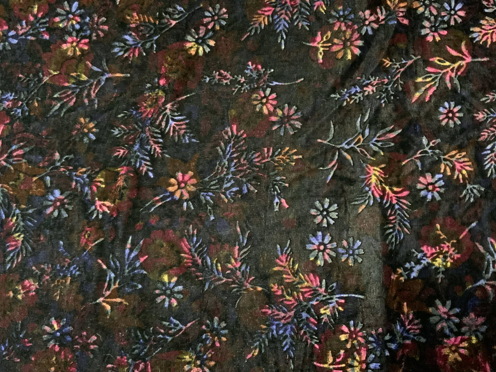 Dark Colored Velvet Floral Motif Textile, Fabric: A cut piece of dark multi tone velvet fabric with floral motif, reverse is lined with possibly synthetic material. Can be used for crafting, sewing, or other textile projects. In good condition, needs