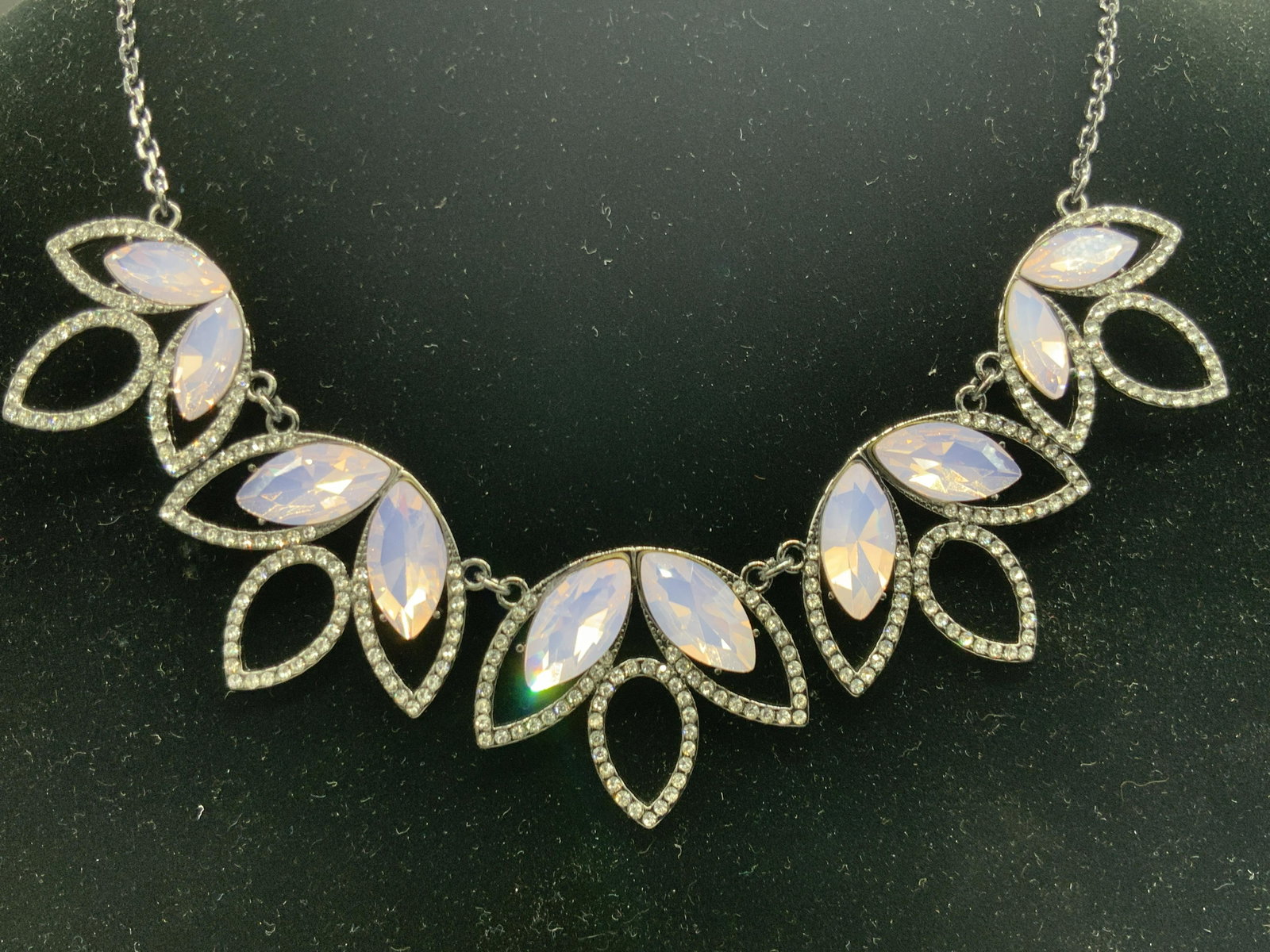 INC NWT Bib Style Crystal Necklace, Jewelry: Bib style necklace crafted from gunmetal hued metal. Open metalwork design featuring Durand navette form faceted crystals. Light purple and colorless hues. Original tag attached reads INC. Necklace le