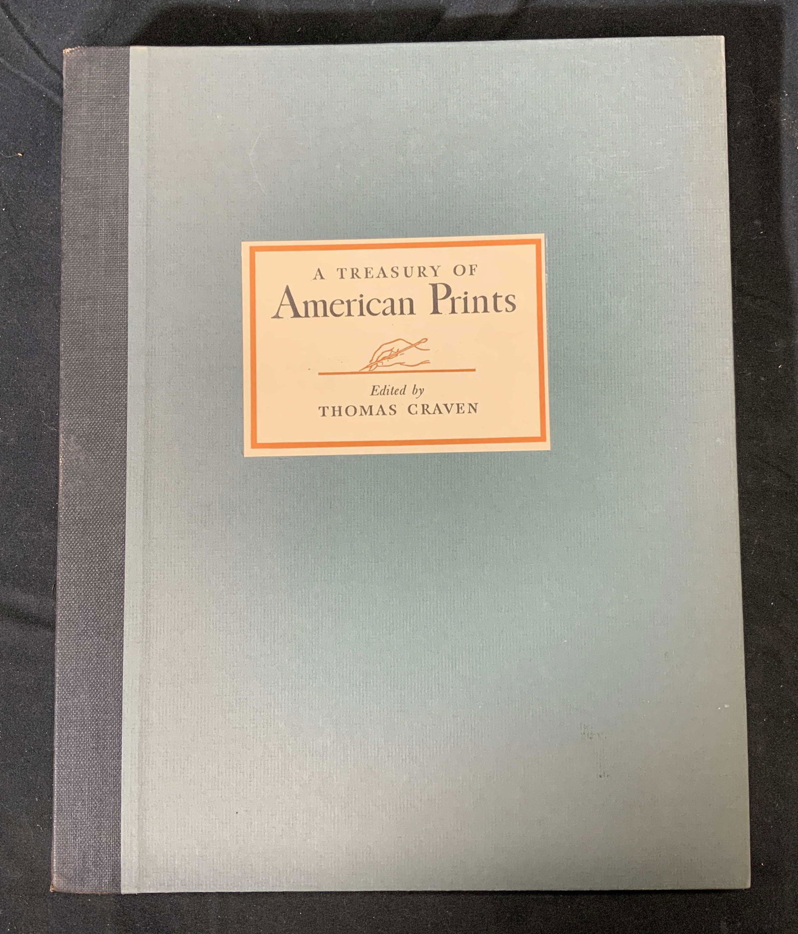 First Edition Treasury of American Prints, Craven: First edition copy of A Treasury of American Prints edited by Thomas Craven. Published by Simon & Schuster, 1939. Spiral bound. Includes black slipcase. Wear to slipcase, cover, binding, and pages con