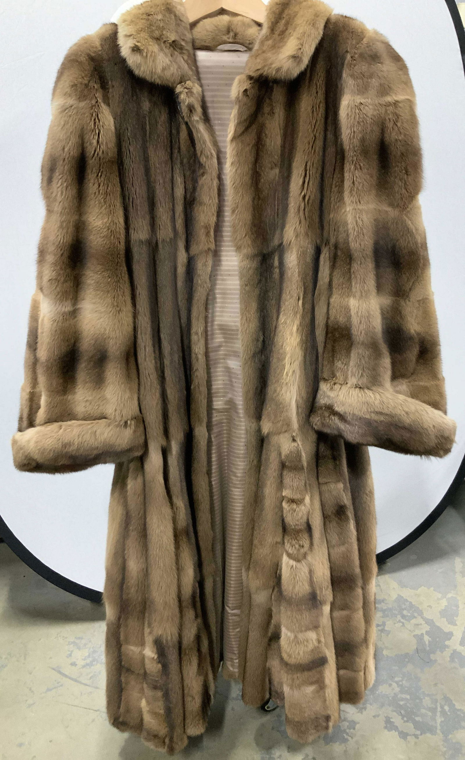 Autumn Haze Full Length Mink Coat: Vintage Autumn Haze full length formal fur coat, unlabeled. Fully lined. possibly c. 1980s . Rolled cuffs, hook and loop closure at neck, hips, waist and chest. Net stitching and hems. A lighter brown