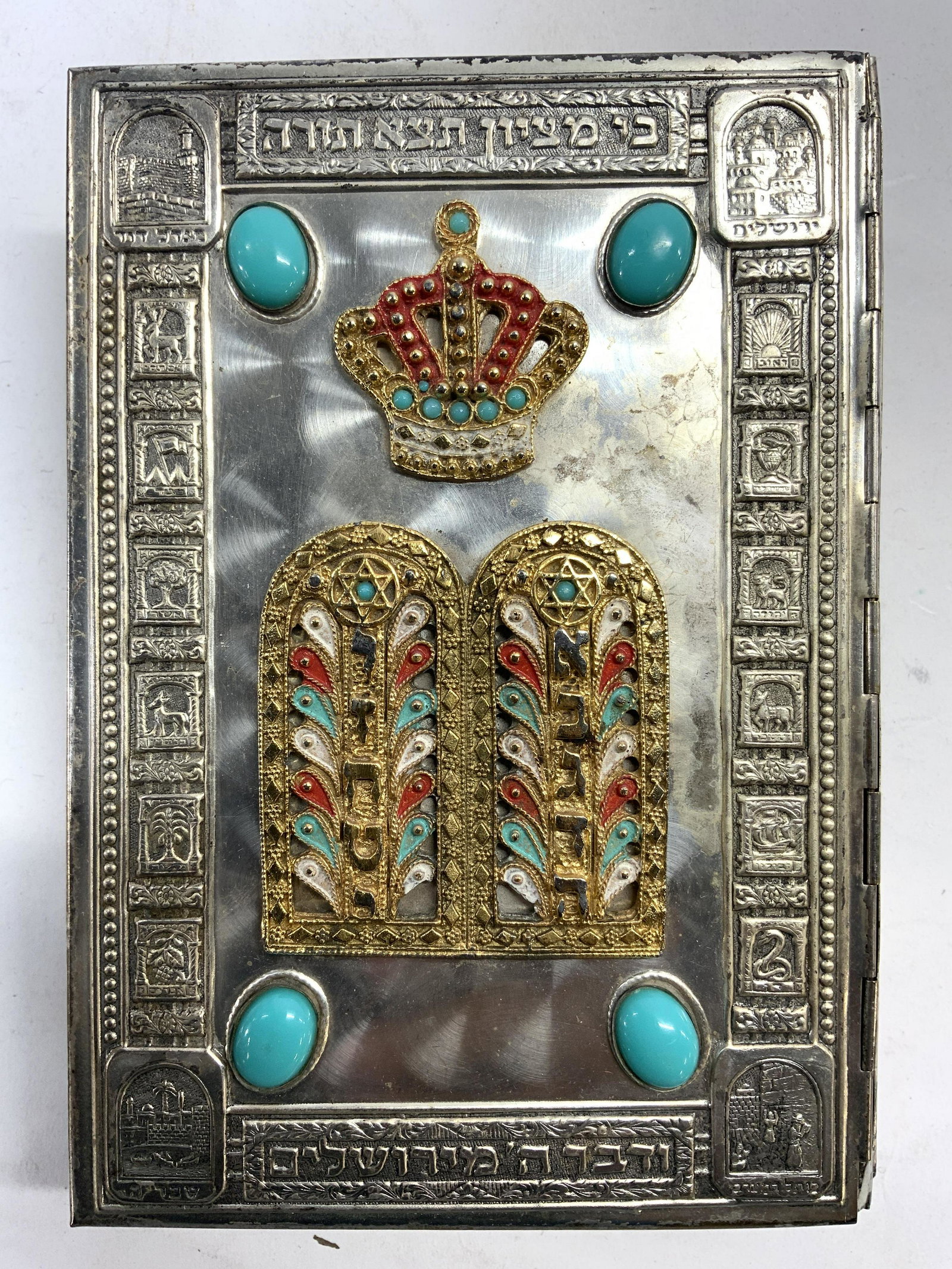 Vintage SIDDUR SIM SHALOM: Siddur is vintage. Piece has silver toned metal cover. Exterior also has menorah, & crown detail. Piece also has Hebrew characters. Measures approx 7 inches tall 5 inches deep. Siddur, judaica, Hebrai
